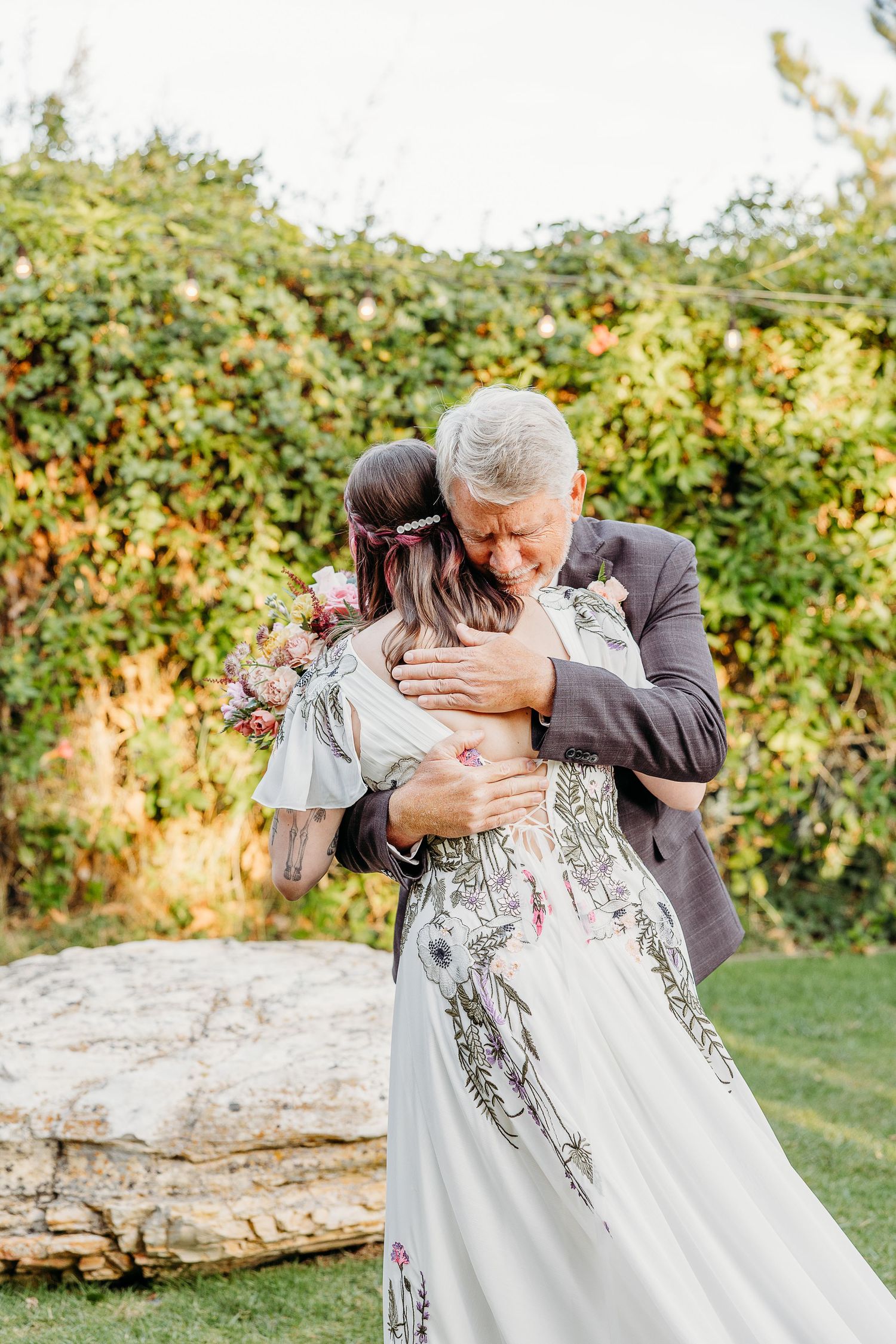 An emotional wedding ceremony moment captured in a series of photos at an outdoor garden venue.