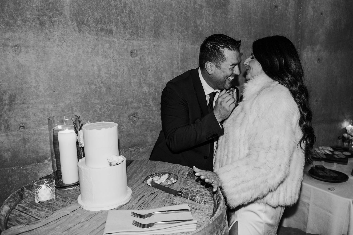 Black and white candid reception moments captured at wedding celebration.