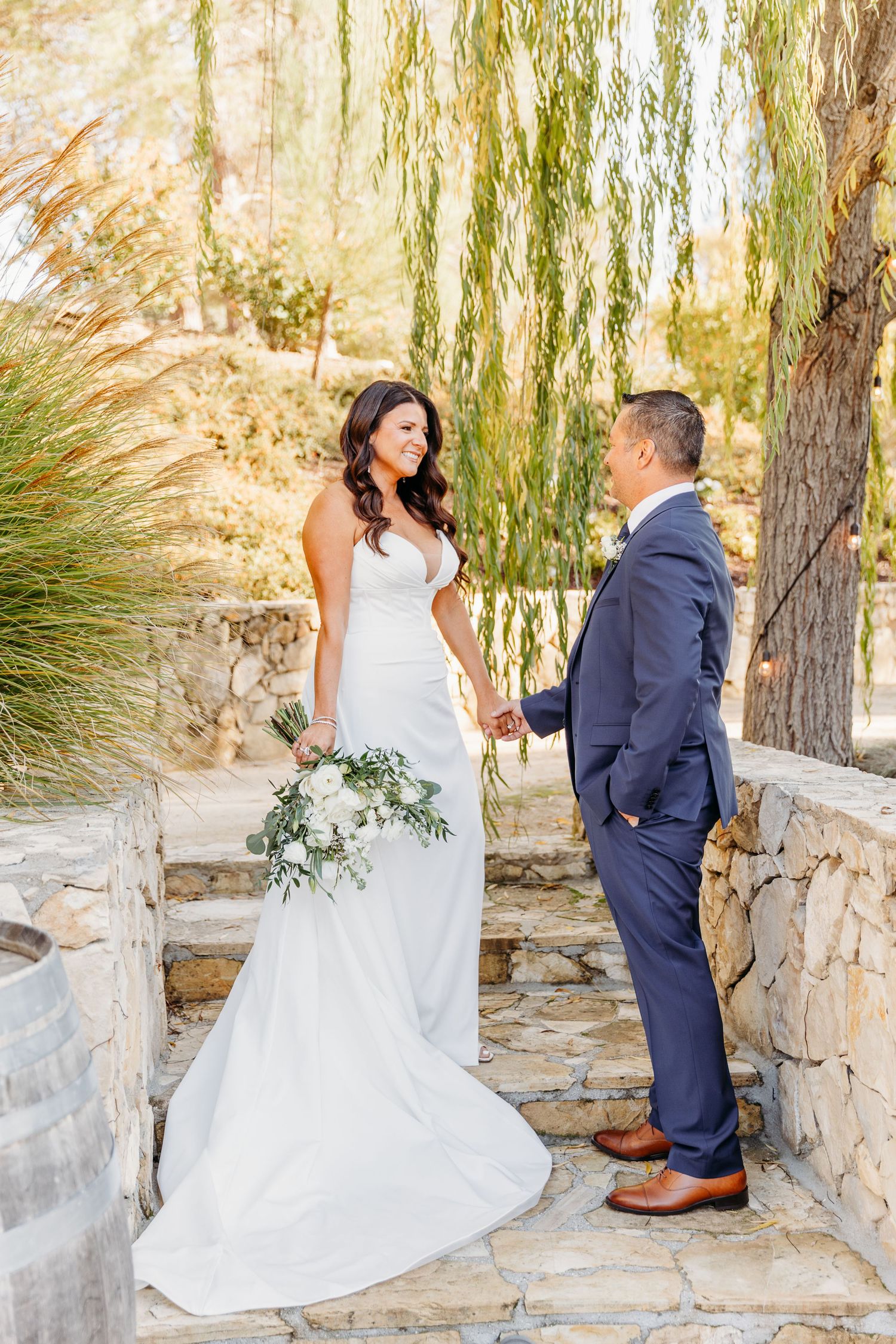 Wedding photography sequence showing couple on stone steps with willow trees in background.
