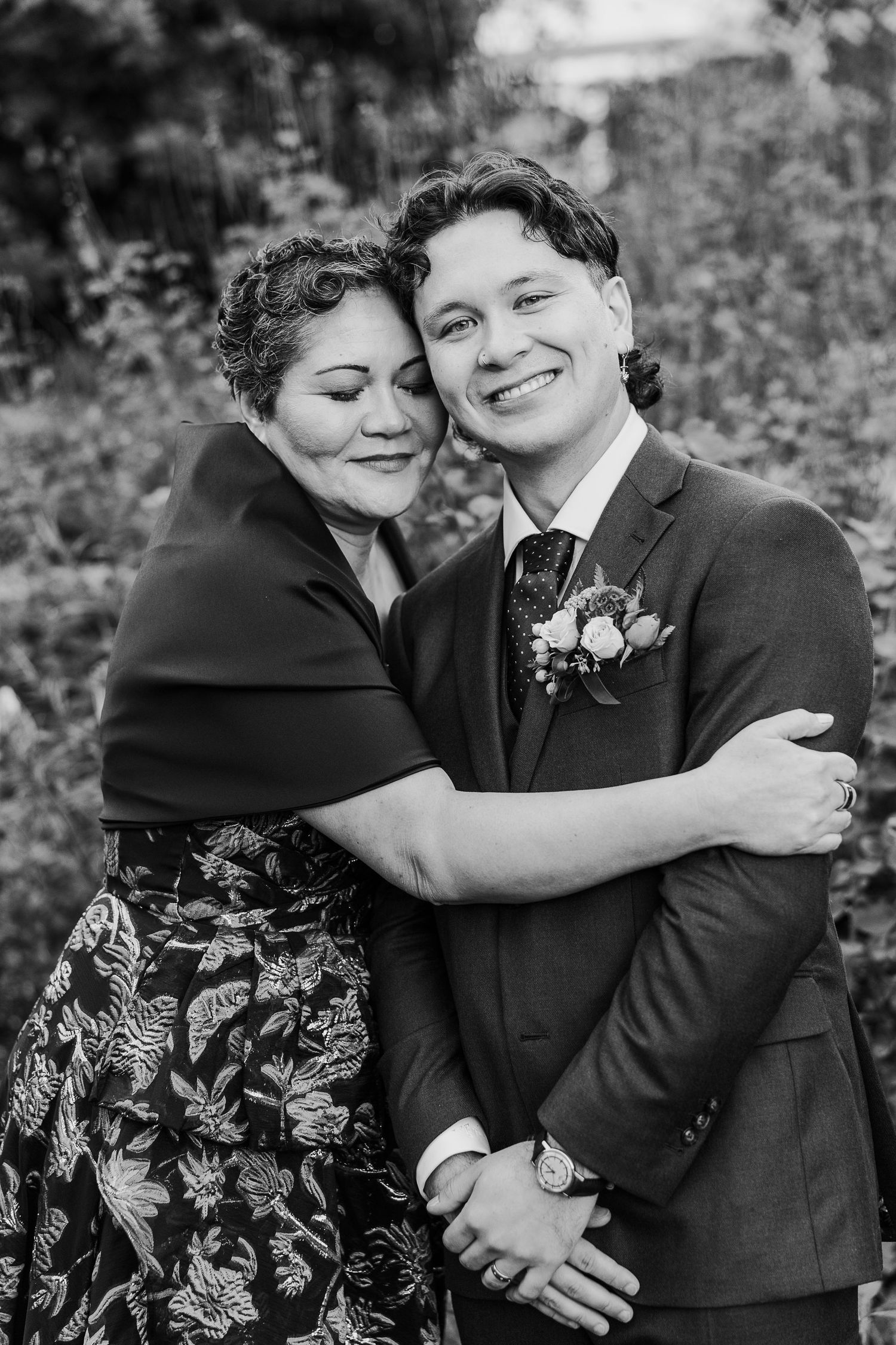 A tender black and white wedding photo series showing intimate moments between two people.