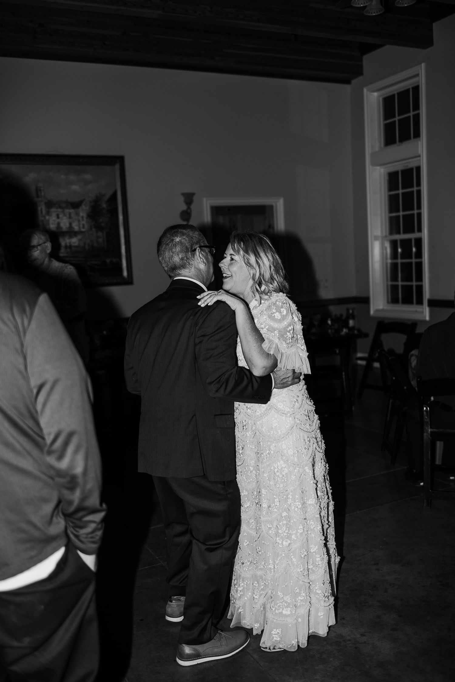 Romantic dance moments captured during an evening wedding reception.