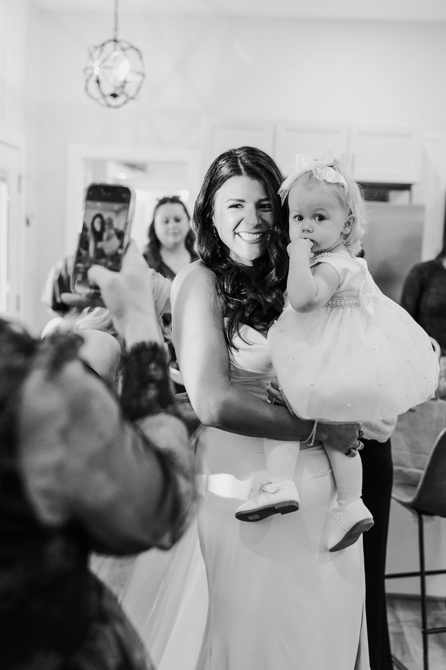 Black and white photos show couples dancing together at a wedding reception celebration.