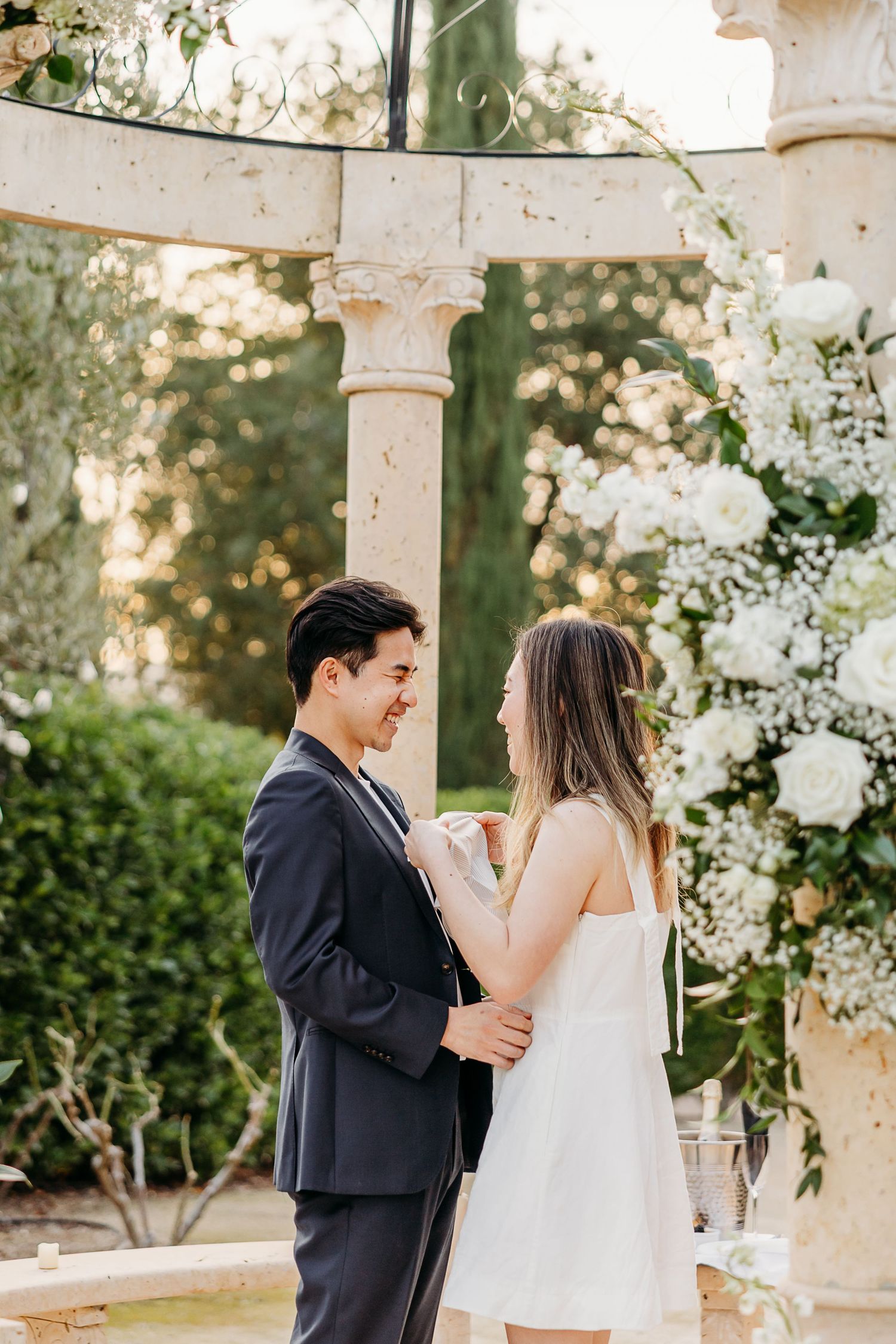 Couple celebrating just after the proposal at Allegretto in Paso Robles