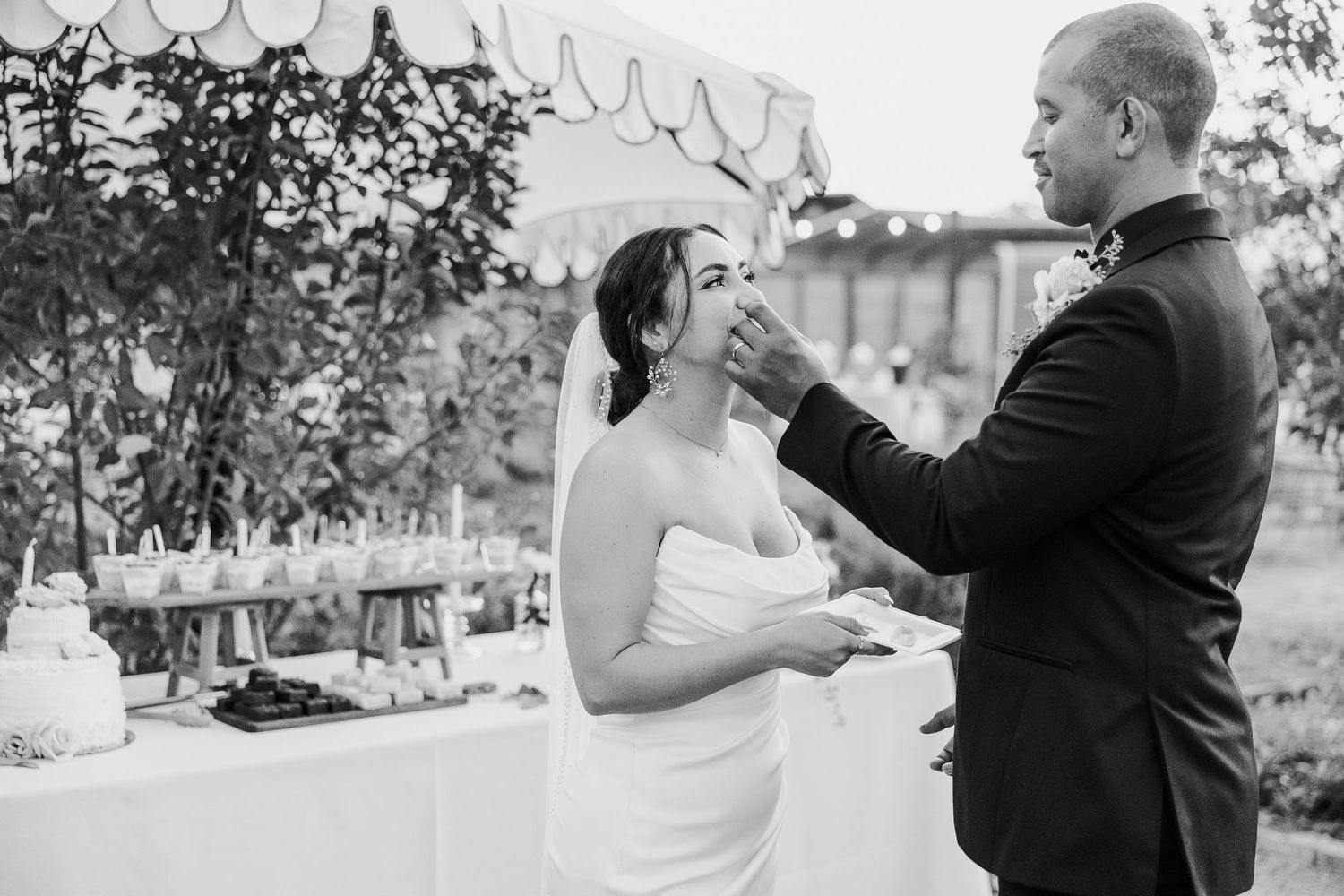Black and white photos showing joyful moments during a wedding celebration.