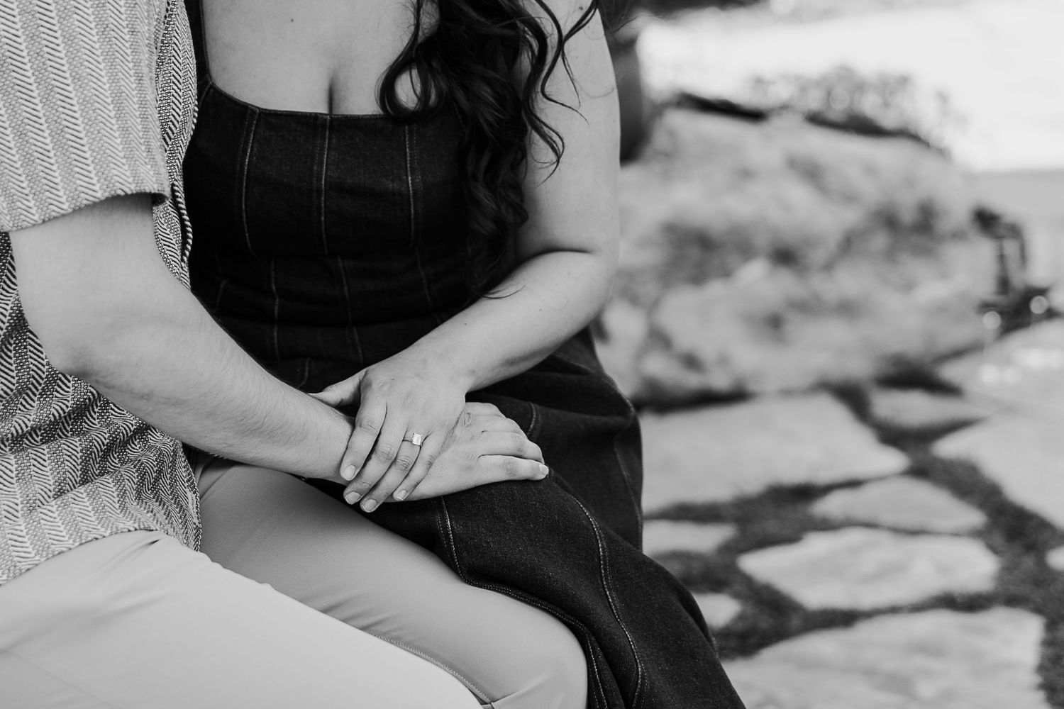 Black and white romantic indoor portrait session with soft natural window lighting.