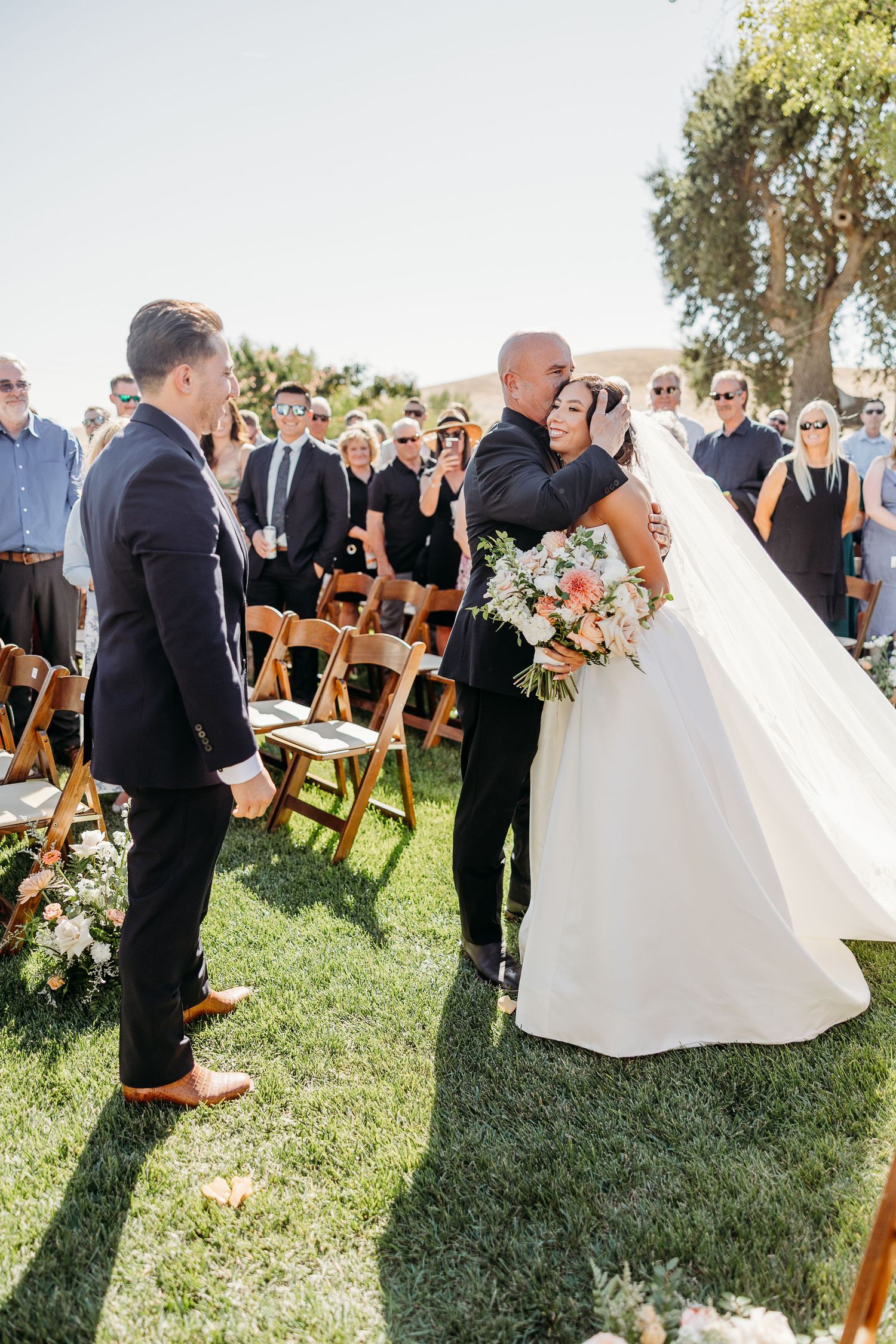 A series of outdoor wedding ceremony moments showing guests and wedding party on a grassy lawn with wooden chairs.