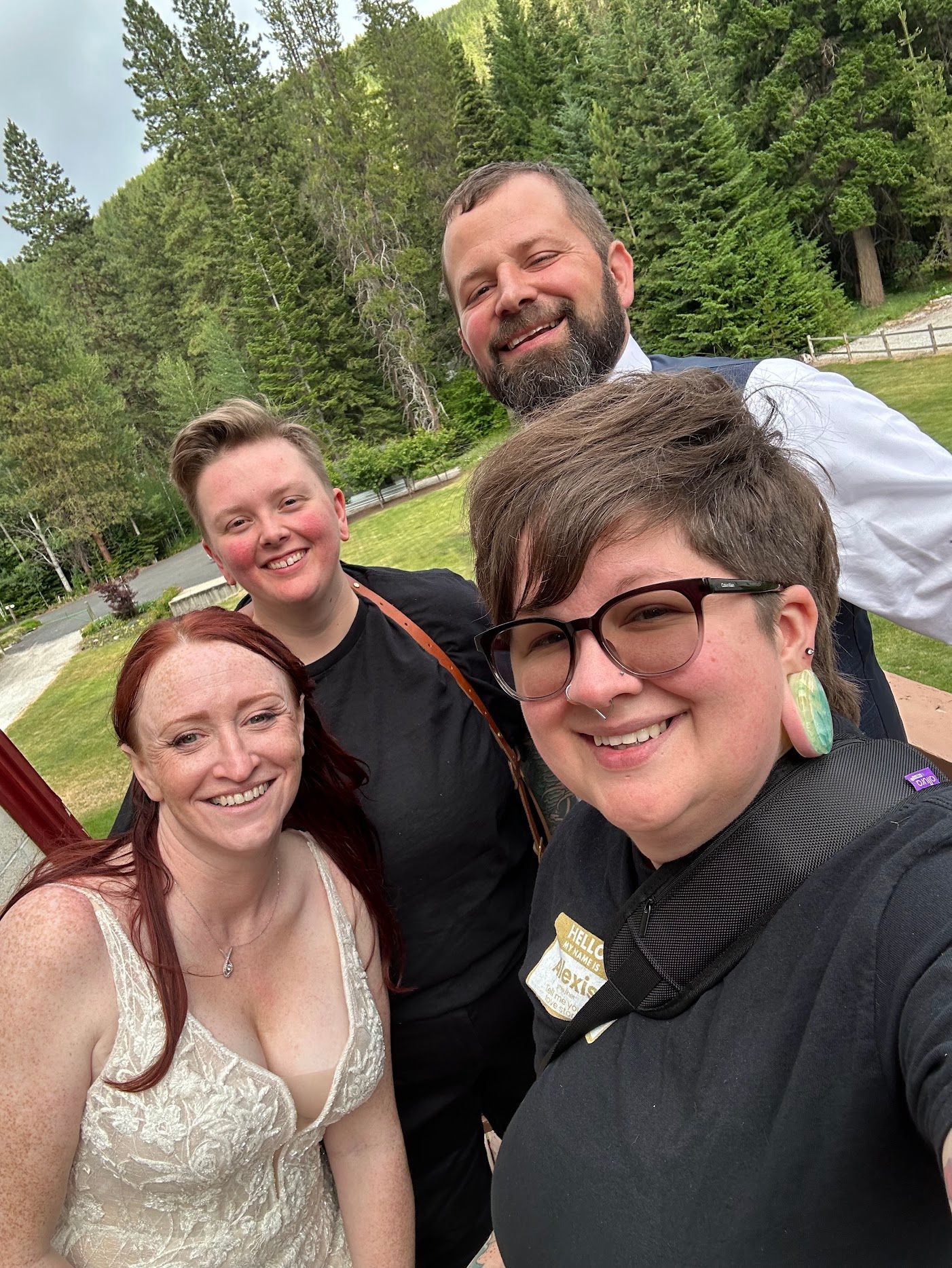 A series of outdoor selfies showing a couple in wedding attire posing together against a green forest backdrop.
