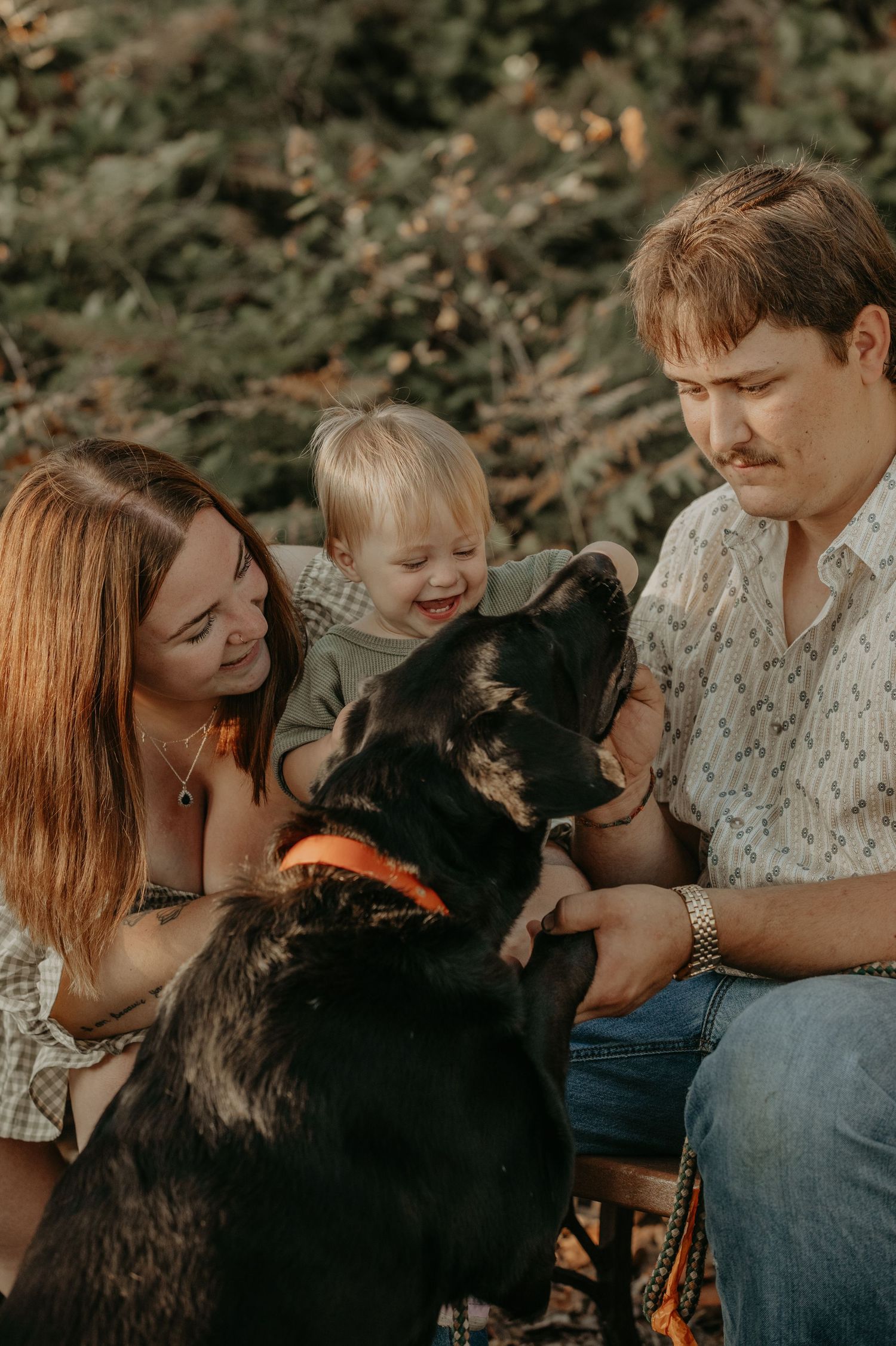 A collage of five intimate outdoor family portraits showing affection and laughter in muted autumn tones.