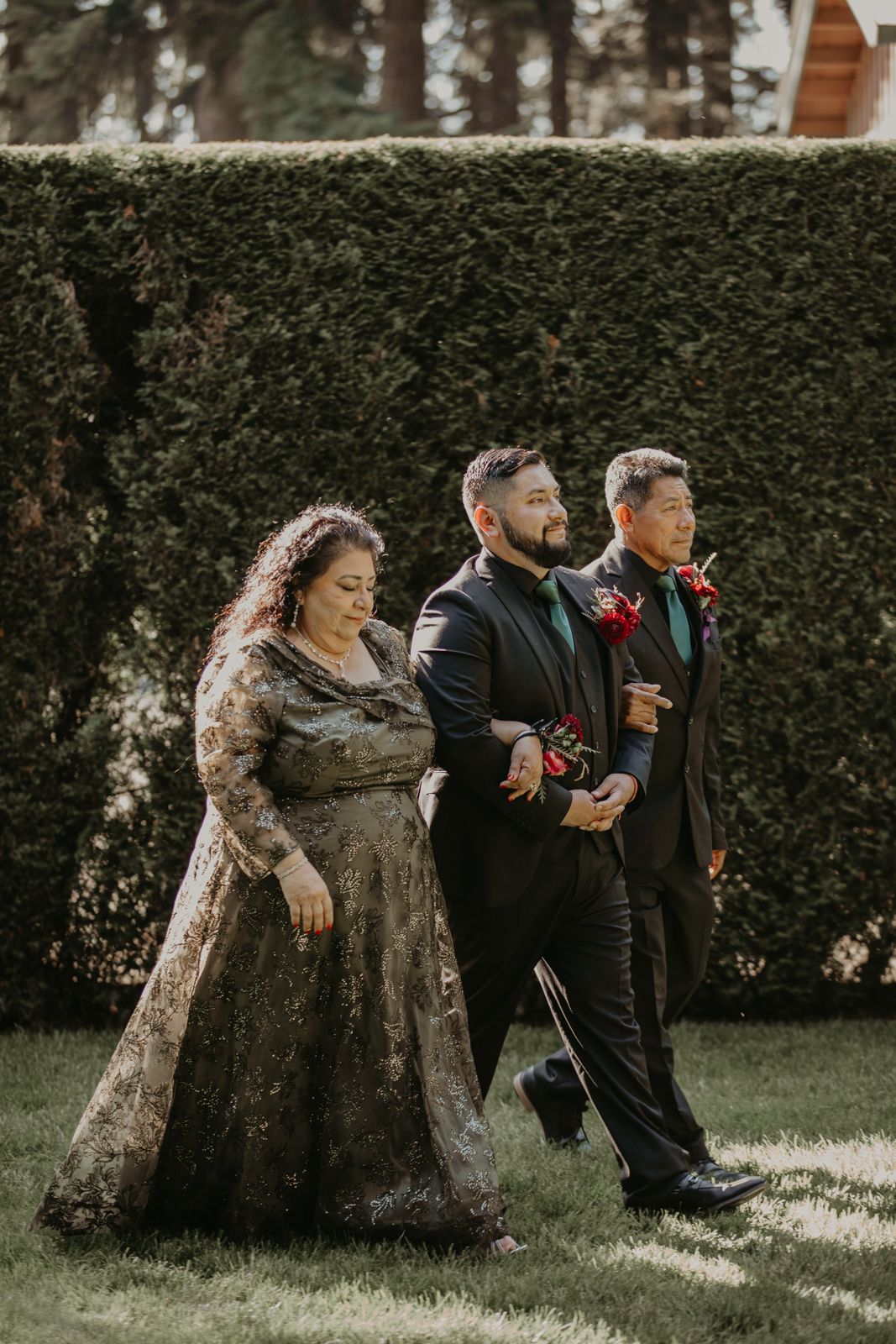 A fun sequence of wedding party photos showing playful poses with groomsmen and bridesmaids against a garden hedge backdrop.