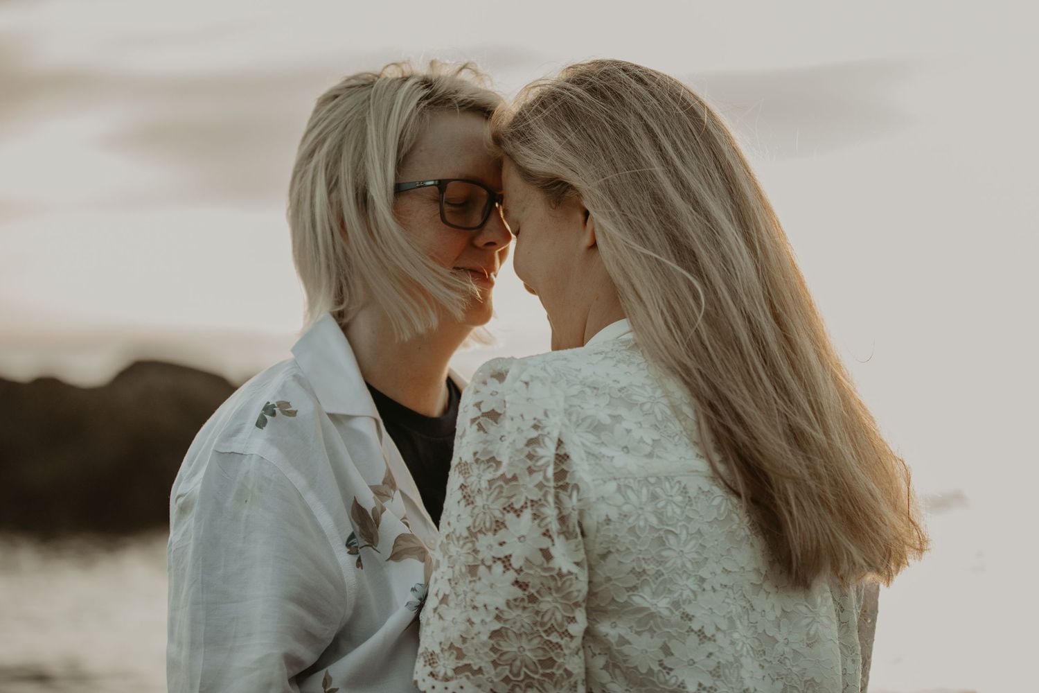 A series of intimate outdoor wedding photos showing embraces and moments between newlyweds at sunset.