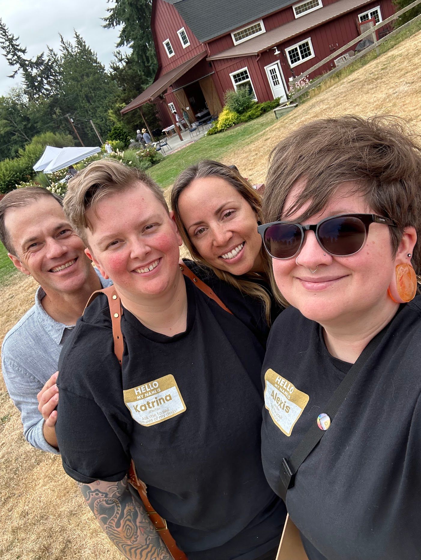 A sequence of casual selfies taken outdoors with a red barn building visible in the background.