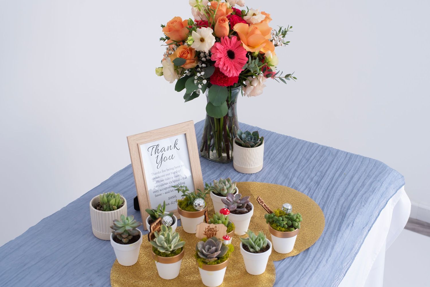 A collage of six images showing succulents in white pots arranged with flowers and decorative elements on wooden surfaces.