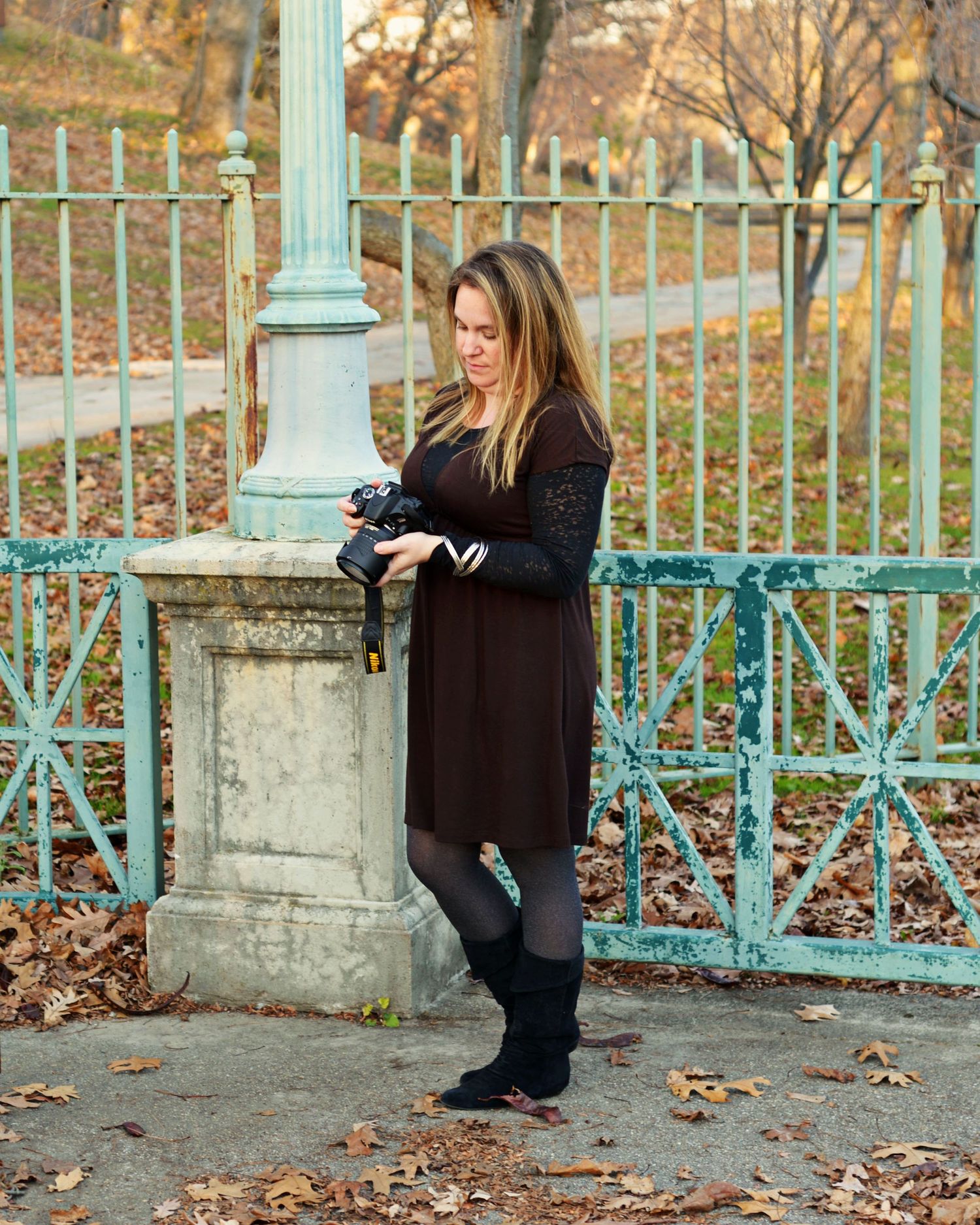 A sequence of photos showing a photographer crouching near a turquoise fence in autumn with fallen leaves on the ground. Roger Williams Park