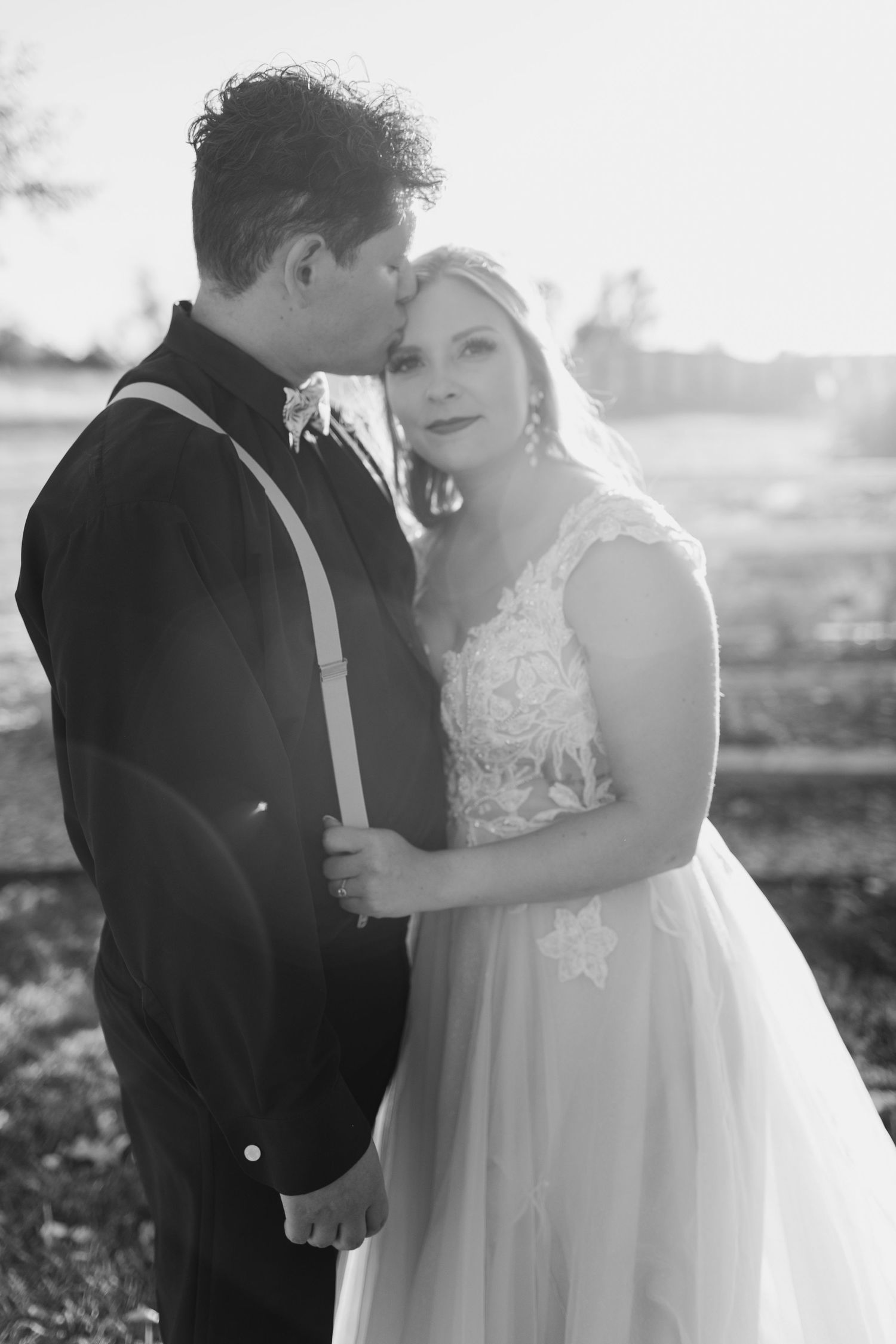 A tender black and white wedding photography sequence showing a couple's intimate moments.