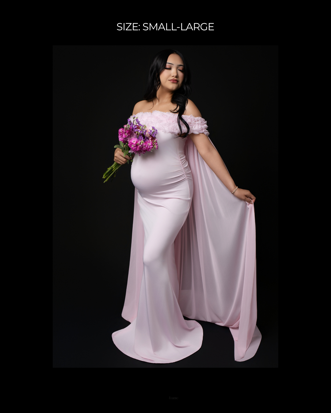 Pregnant woman in pink off-shoulder maternity gown with cape, holding purple flowers, size small-large.