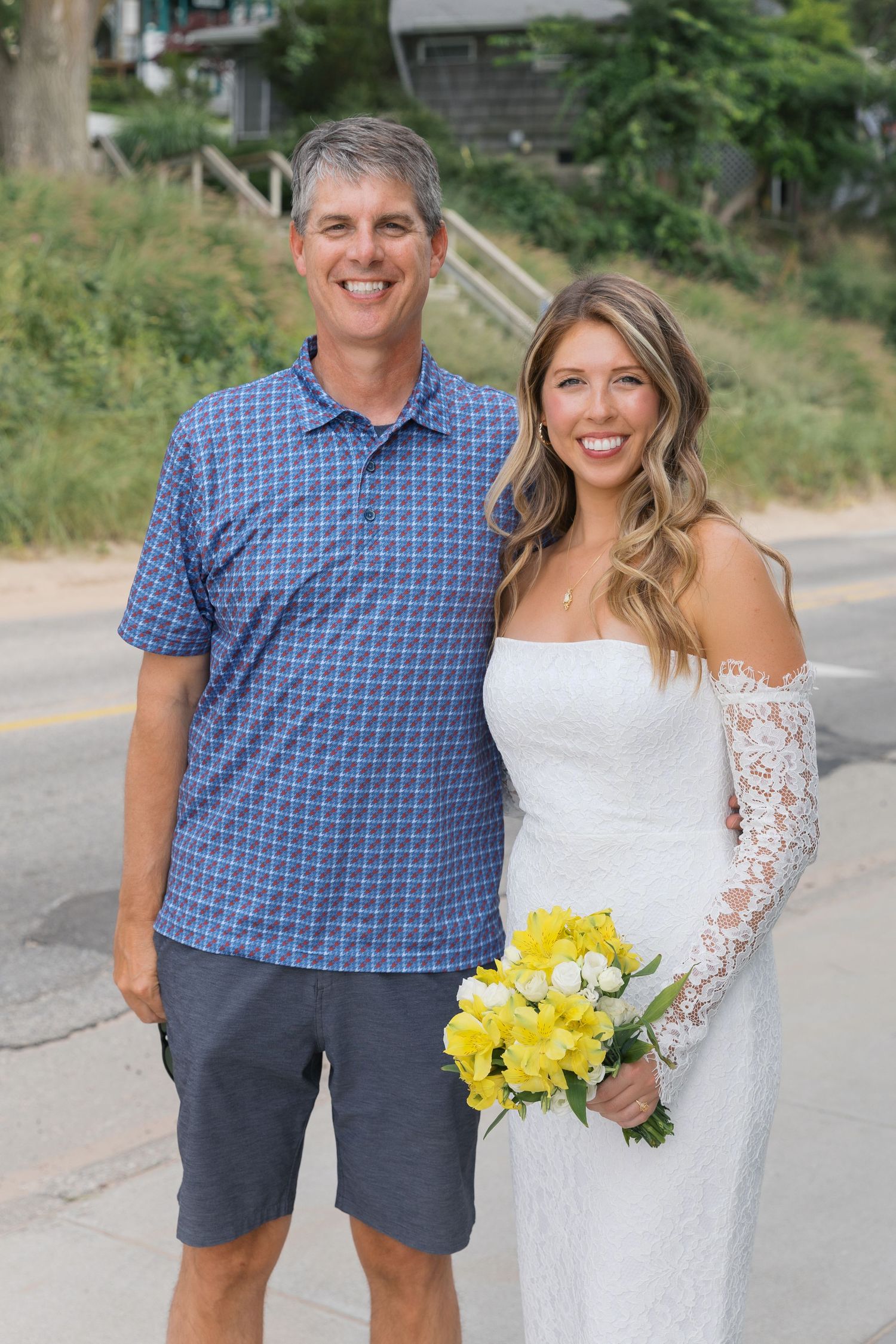 Grand Haven Michigan Elopement Photography at Grand Haven City Beach on Lake Michigan. Coastal summer elopement. From, Rayna Photography