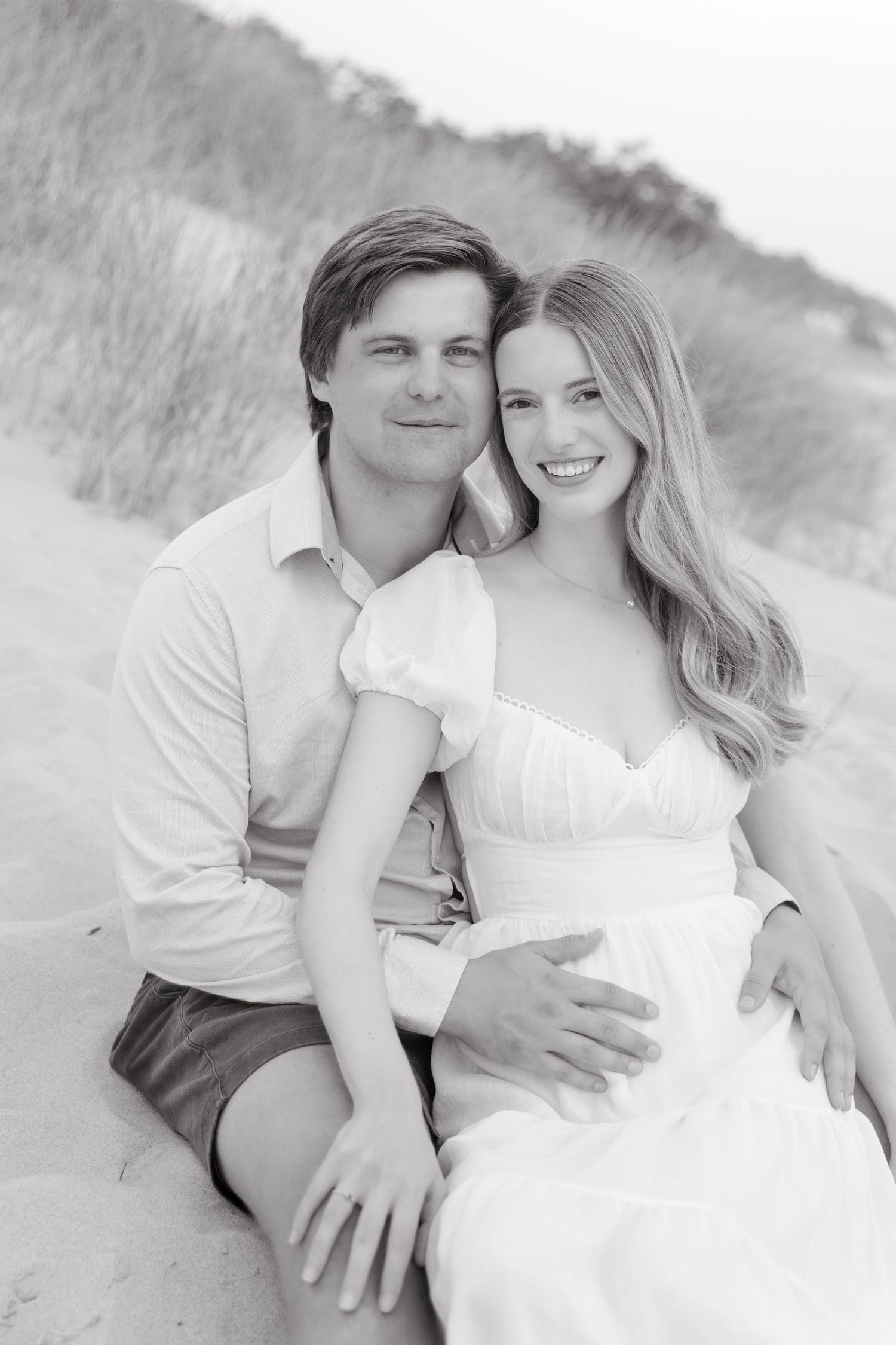 Grand Haven beach and boardwalk coastal midwest town on lake michigan engagement pictures during the summer Grand Haven Wedding photographer
