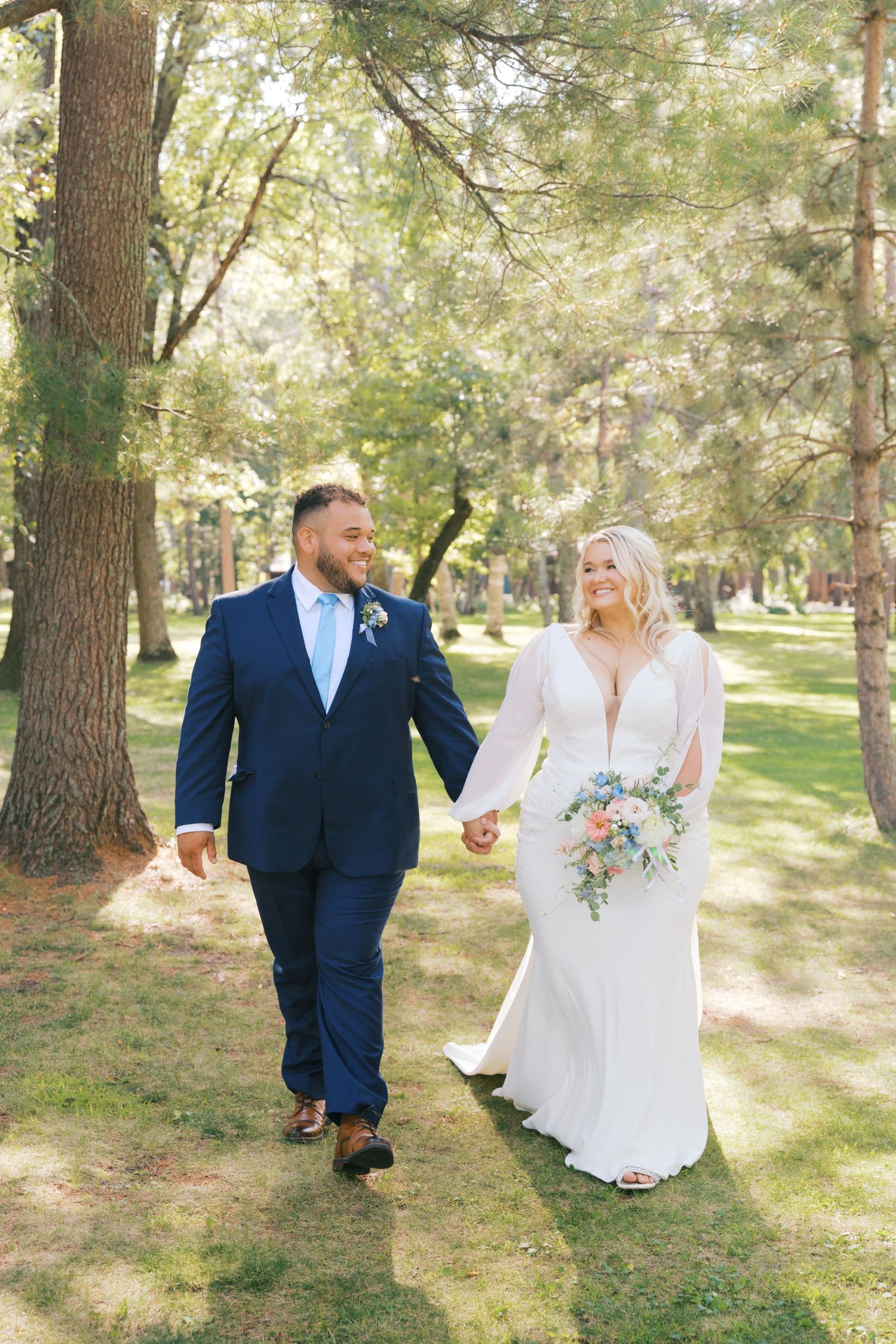 Summer Camp Themed Wedding Photography at Camp Lincoln Camp Lake Hubert in Nisswa Minnesota. Lakeside woodland wedding pictures Up North