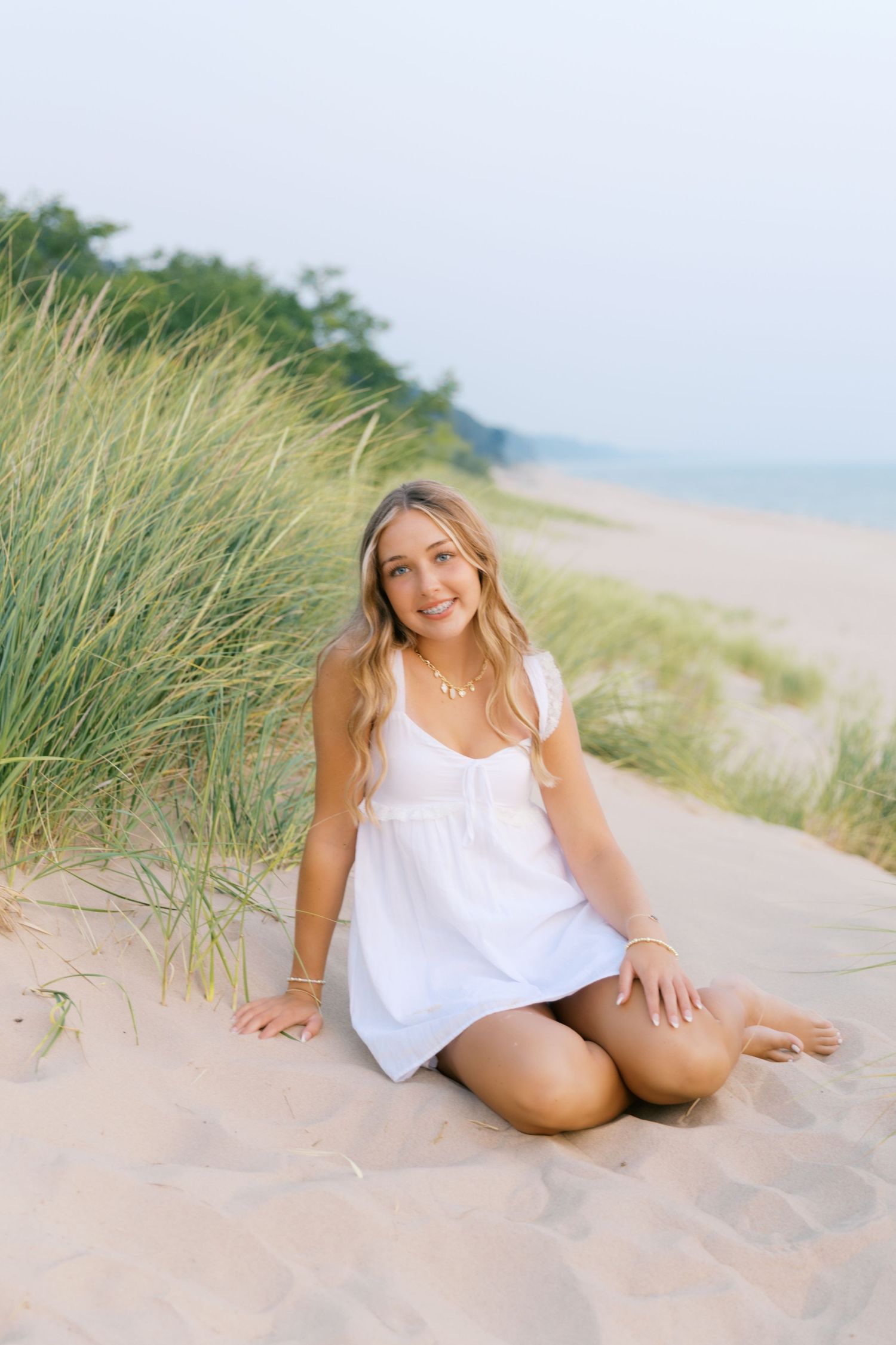 Grand Haven Michigan Beach Photography Family senior engagement photography on Lake Michigan. Grand Haven Michigan Photographer Inspiration