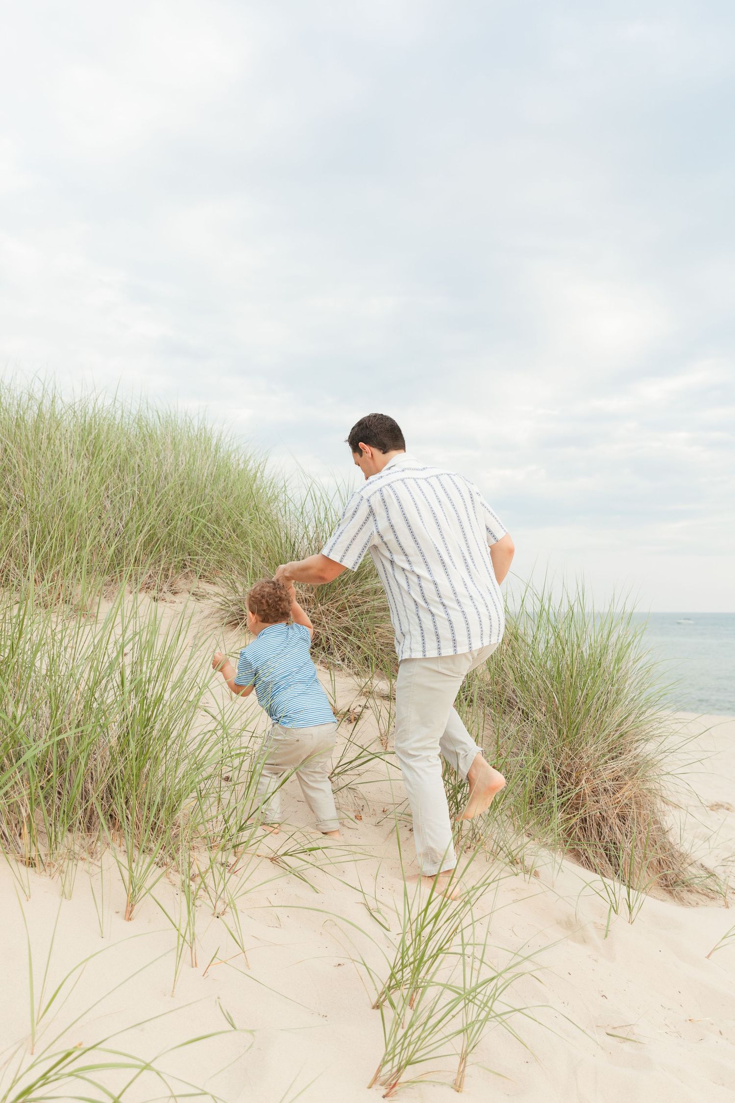Grand Haven Michigan Beach Photography Family senior engagement photography on Lake Michigan. Grand Haven Michigan Photographer Inspiration