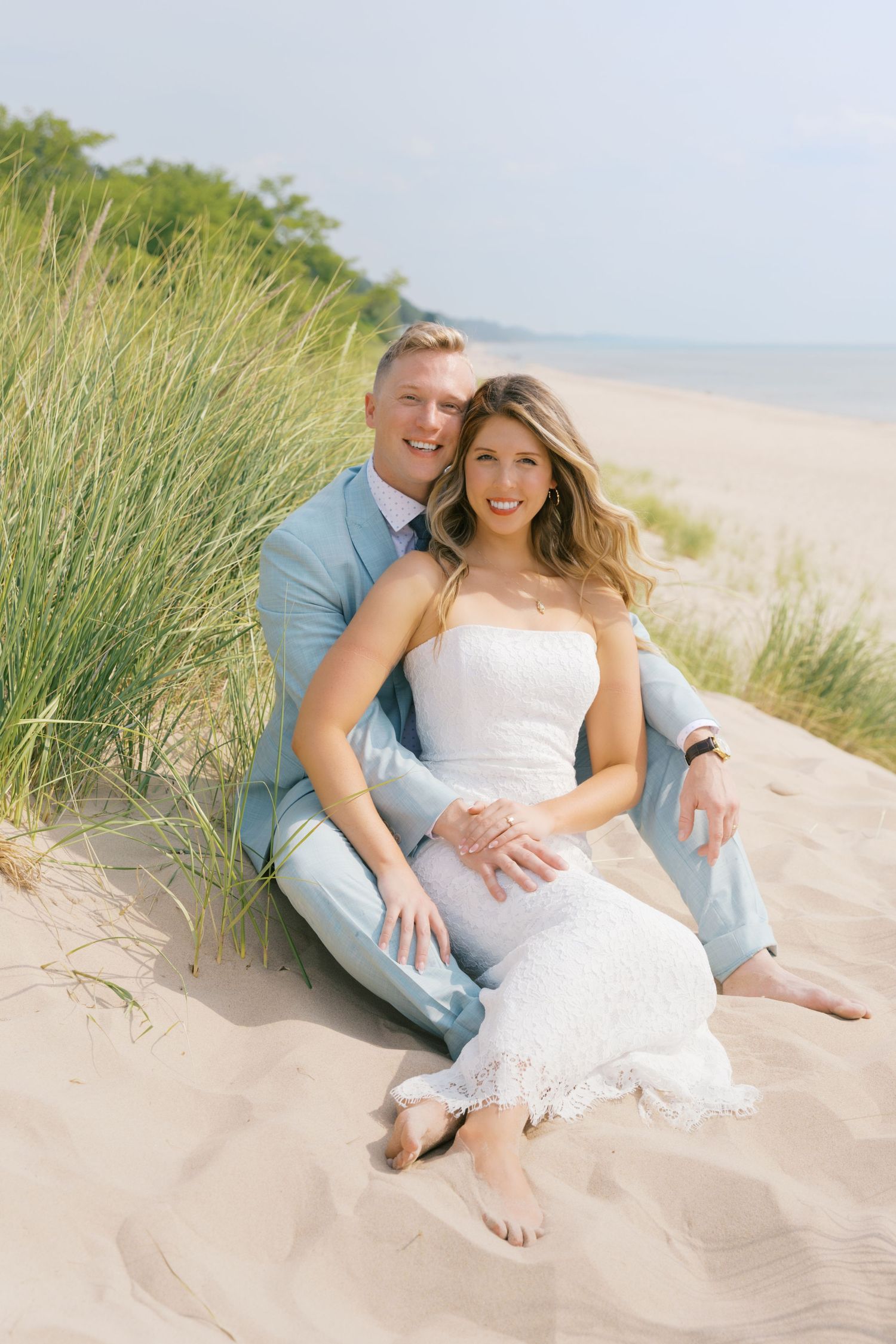 Grand Haven Michigan Elopement Photography at Grand Haven City Beach on Lake Michigan. Coastal summer elopement. From, Rayna Photography