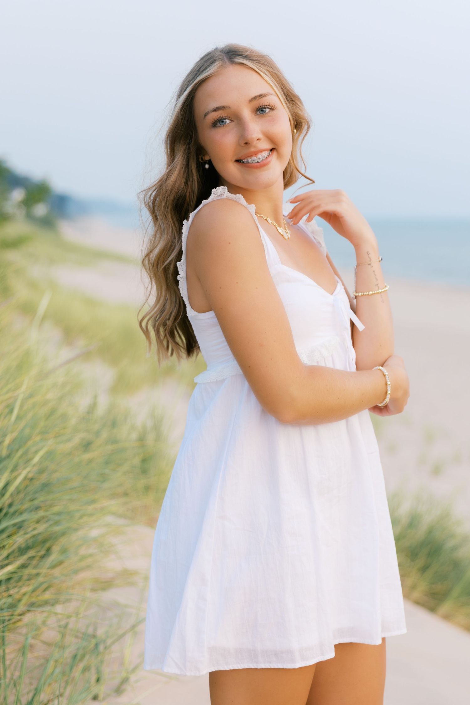 Grand Haven West Michigan Lakeshore Beach Grass Sand Dunes Boardwalk Senior Pictures Portrait Photographer. Summer at Sunset Golden Hour