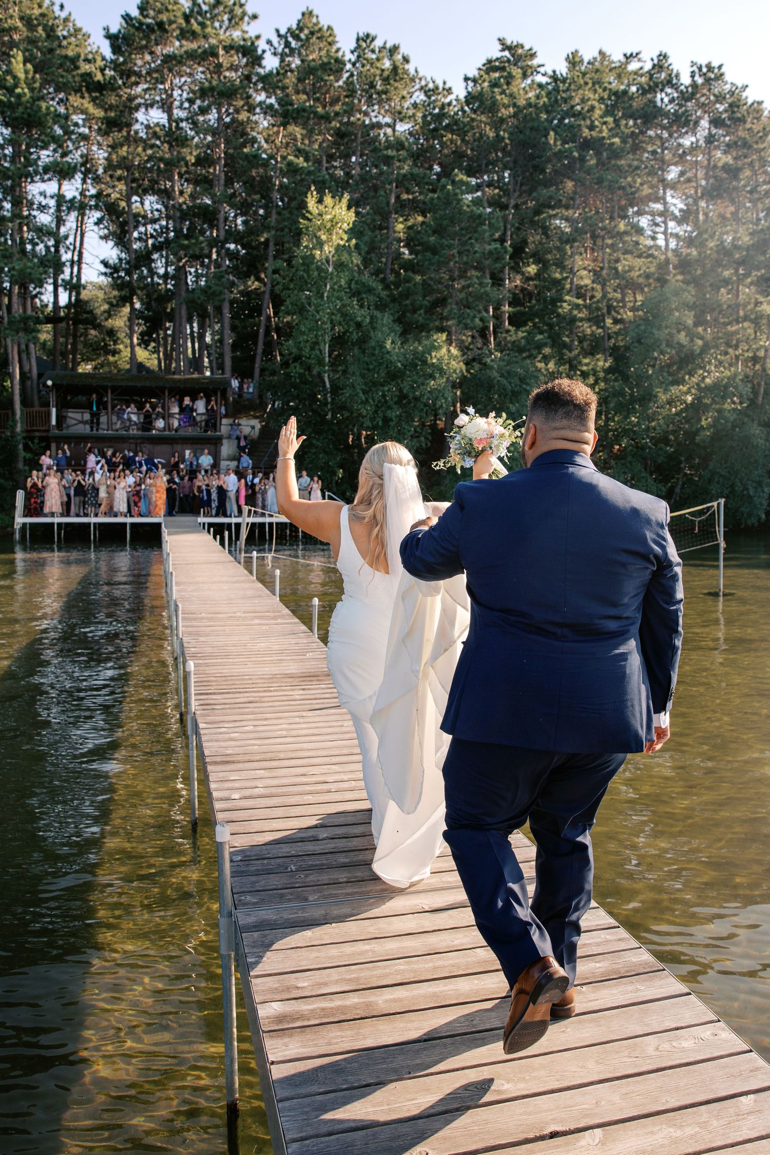 Summer Camp Themed Wedding Photography at Camp Lincoln Camp Lake Hubert in Nisswa Minnesota. Lakeside woodland wedding pictures Up North