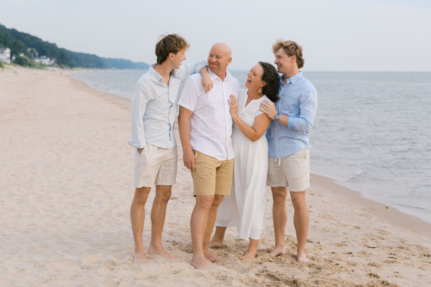 Grand Haven Summer Beach Family Pictures Lake Michigan. West Michigan Family Photographer Blue and white beach family outfit inspiration