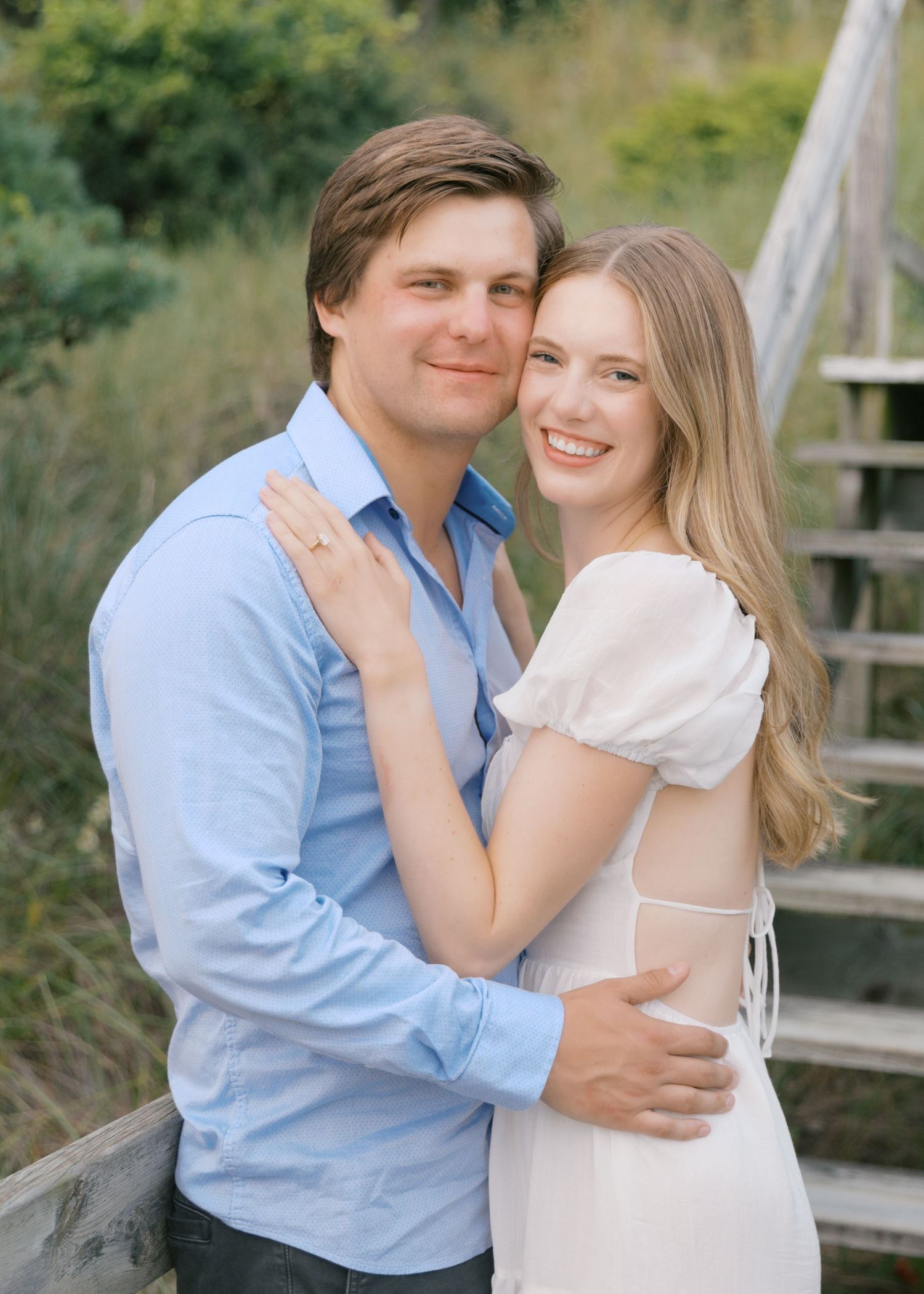 Grand Haven beach and boardwalk coastal midwest town on lake michigan engagement pictures during the summer Grand Haven Wedding photographer