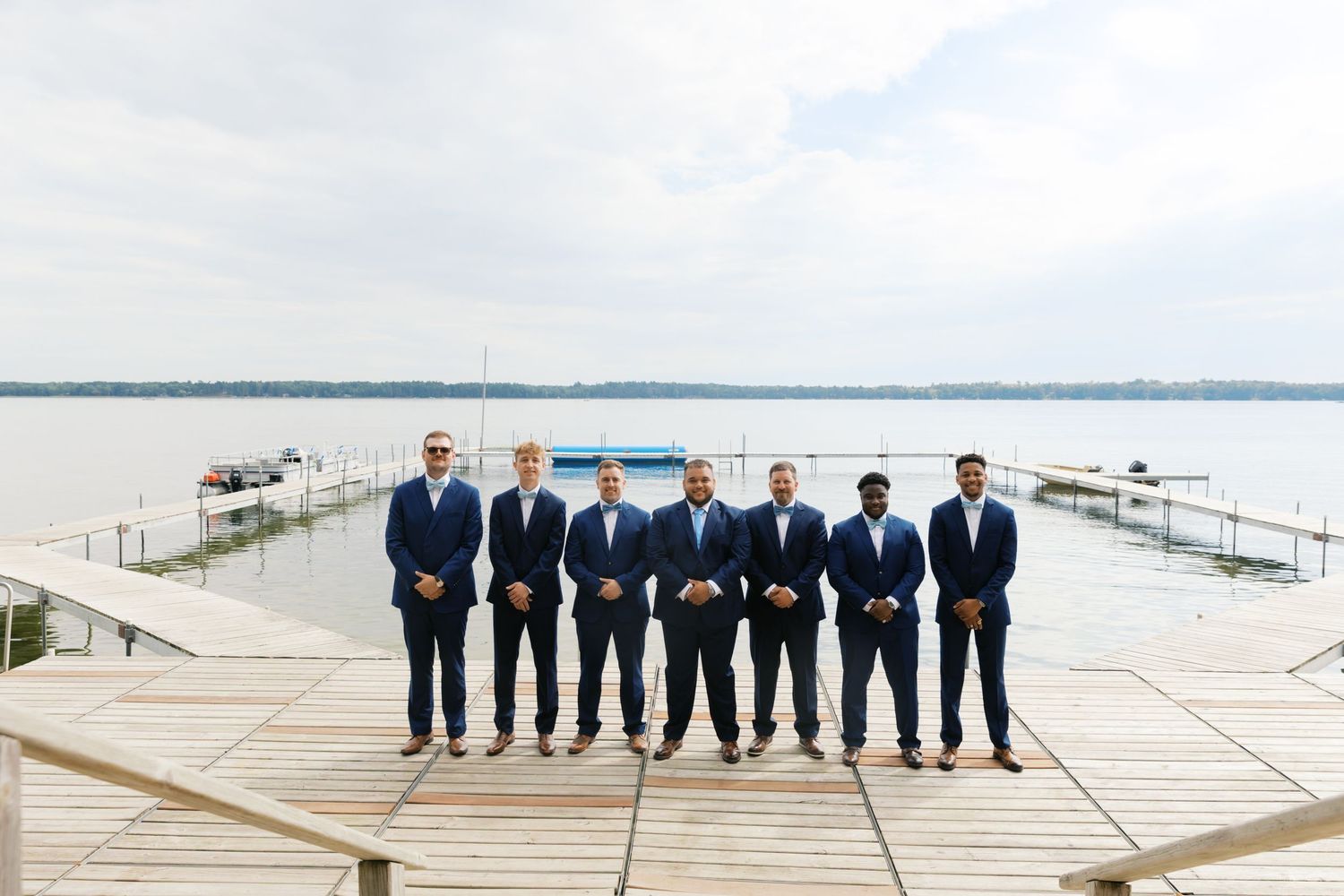 Summer Camp Themed Wedding Photography at Camp Lincoln Camp Lake Hubert in Nisswa Minnesota. Lakeside woodland wedding pictures Up North