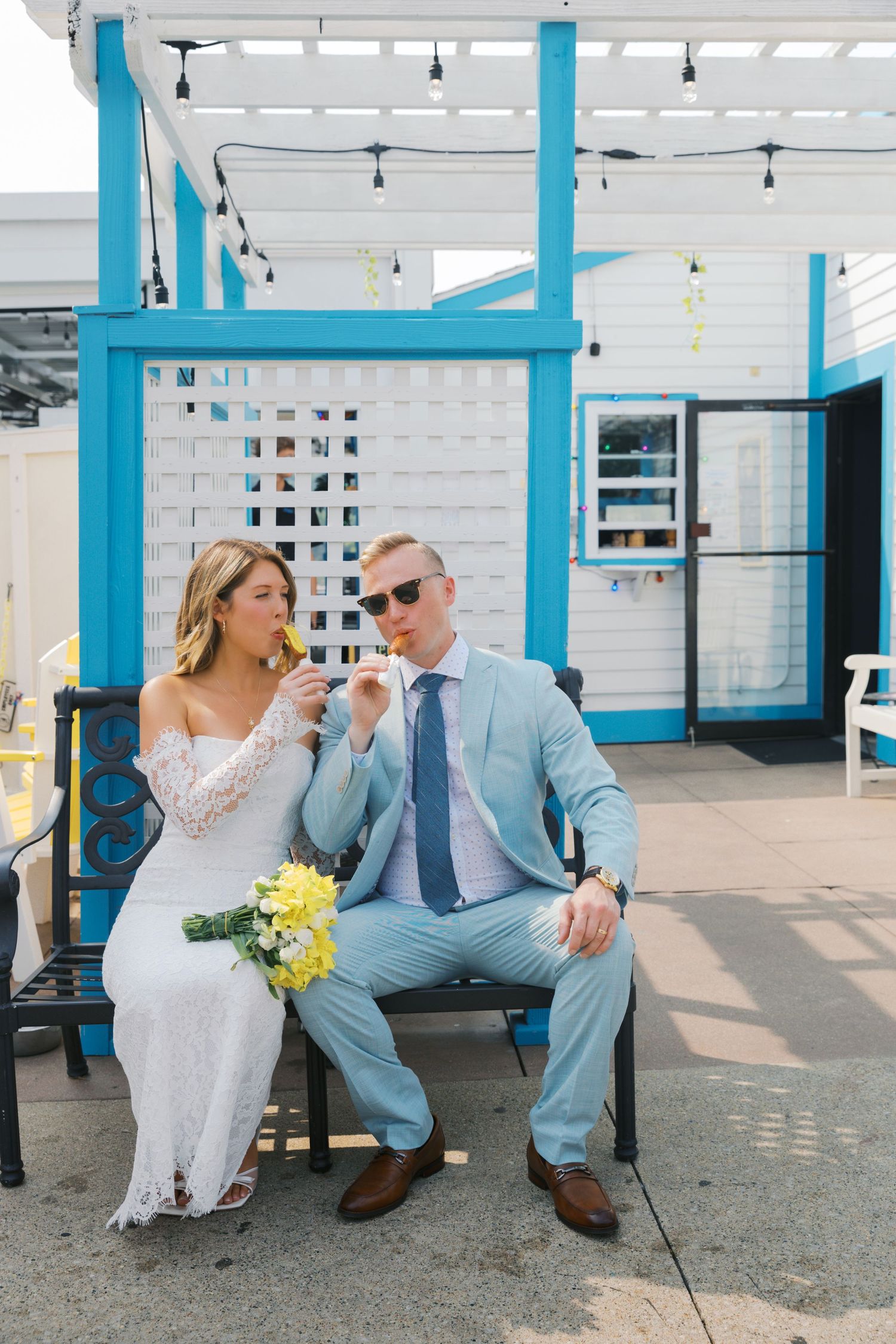 Grand Haven Michigan Elopement Photography at Pronto Pups corndog stand on Harbor Dr. Coastal summer elopement. From, Rayna Photography