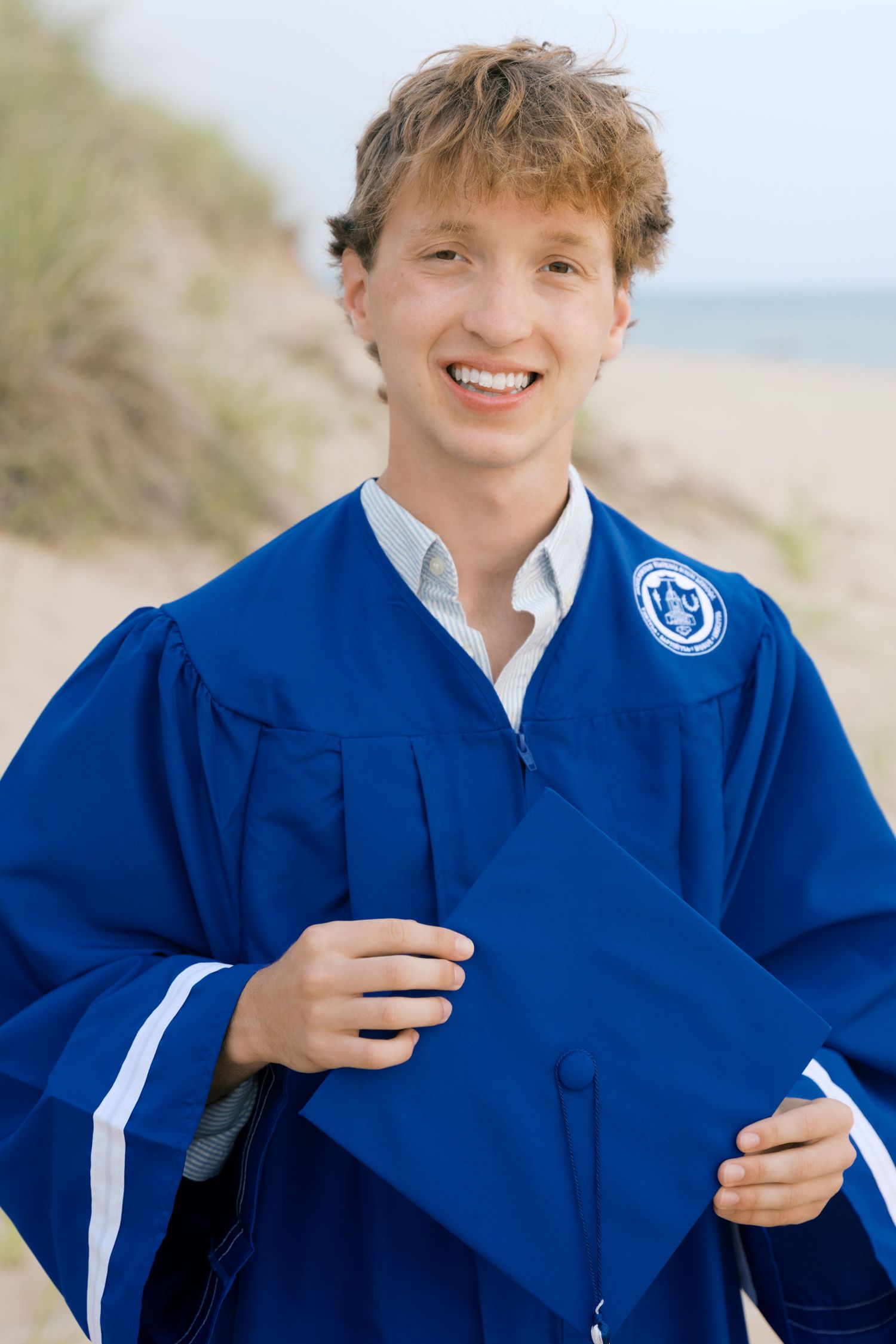 Senior Portrait Photography in Grand Haven Michigan a coastal beachtown on Lake Michigan. Beaches and downtown, sand dunes, senior year