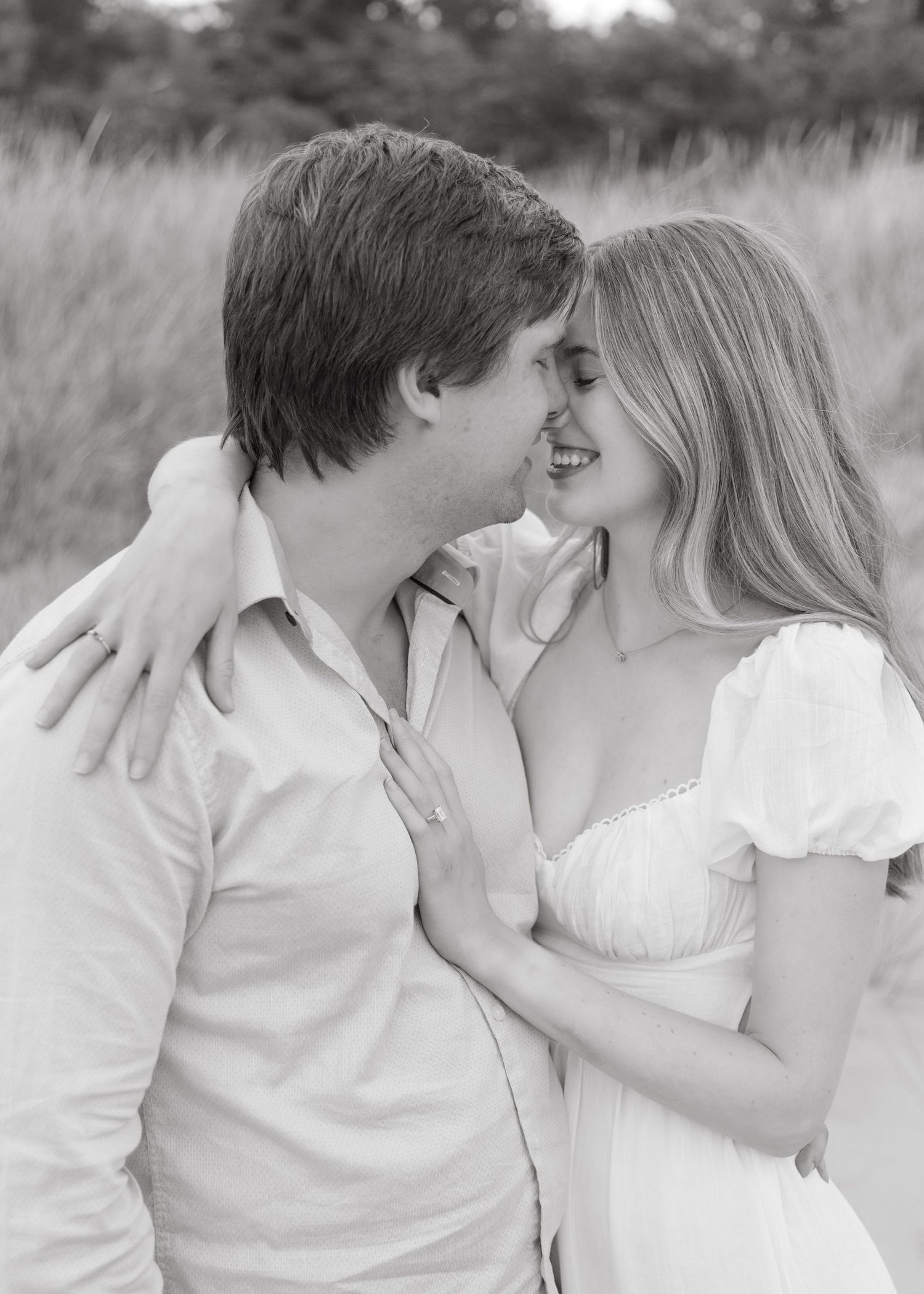Grand Haven beach and boardwalk coastal midwest town on lake michigan engagement pictures during the summer Grand Haven Wedding photographer