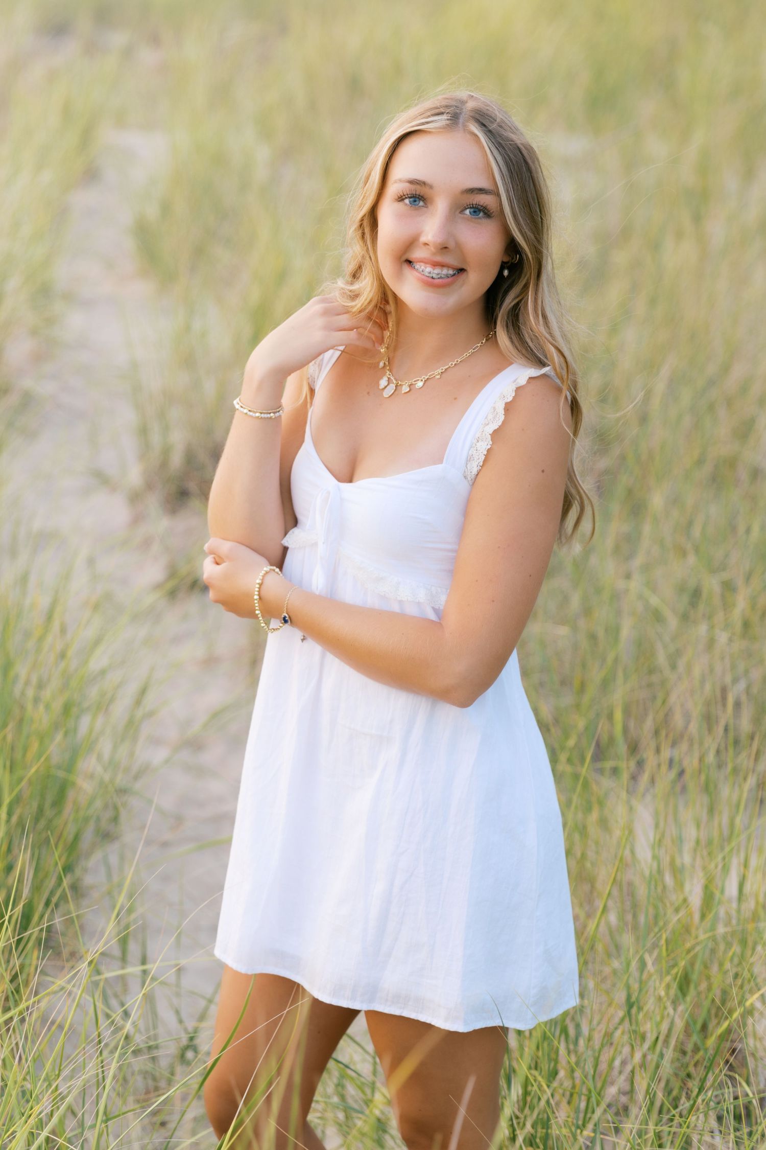 Grand Haven West Michigan Lakeshore Beach Grass Sand Dunes Boardwalk Senior Pictures Portrait Photographer. Summer at Sunset Golden Hour