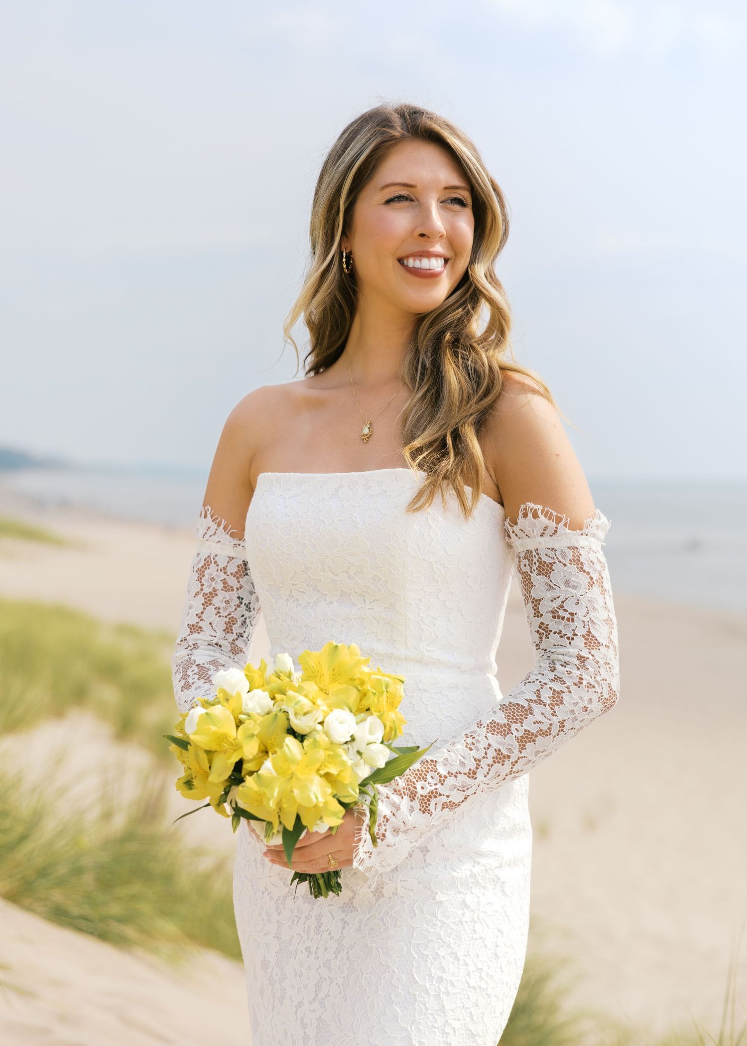 Grand Haven Michigan Elopement Photography at Grand Haven City Beach on Lake Michigan. Coastal summer elopement. From, Rayna Photography