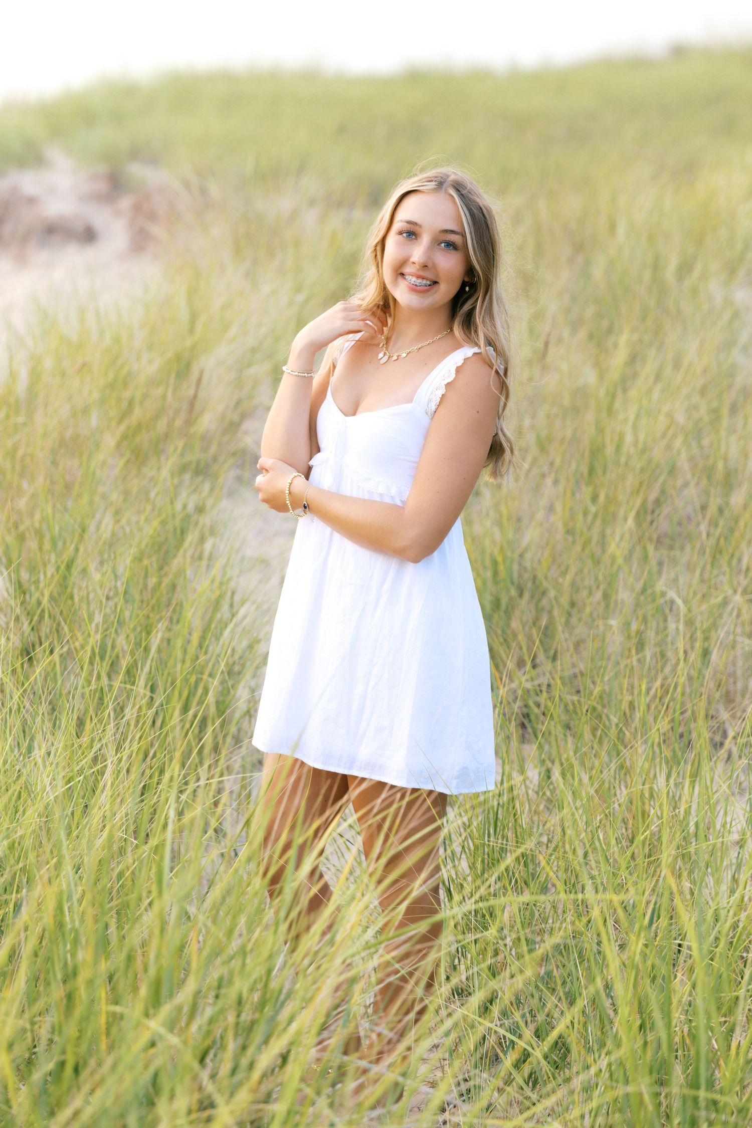 Grand Haven West Michigan Lakeshore Beach Grass Sand Dunes Boardwalk Senior Pictures Portrait Photographer. Summer at Sunset Golden Hour