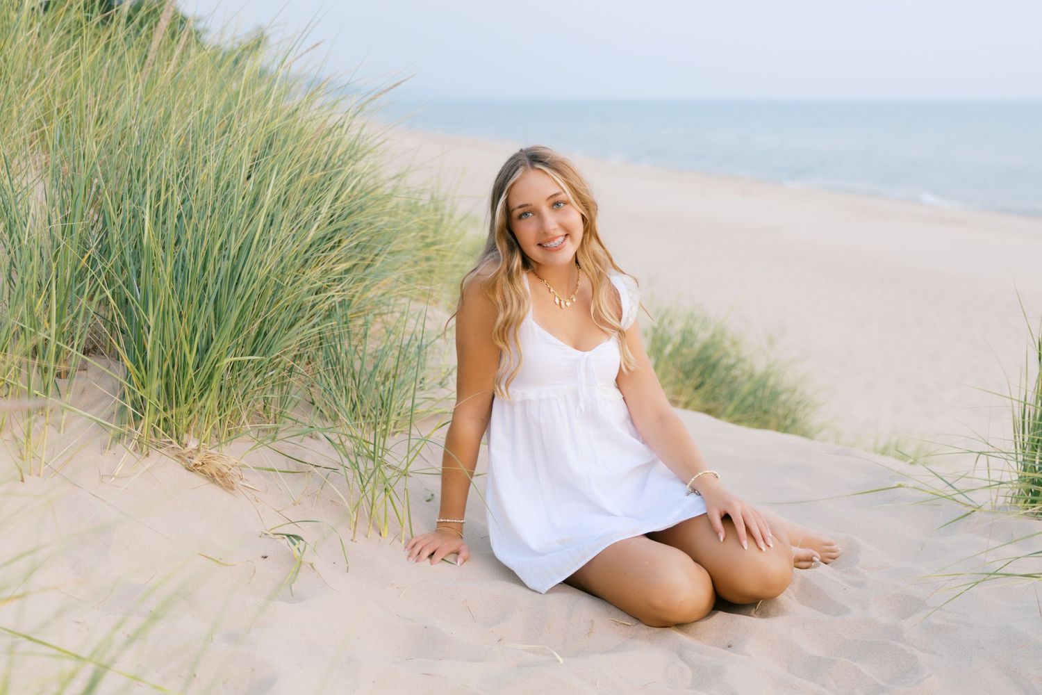 Grand Haven West Michigan Lakeshore Beach Grass Sand Dunes Boardwalk Senior Pictures Portrait Photographer. Summer at Sunset Golden Hour