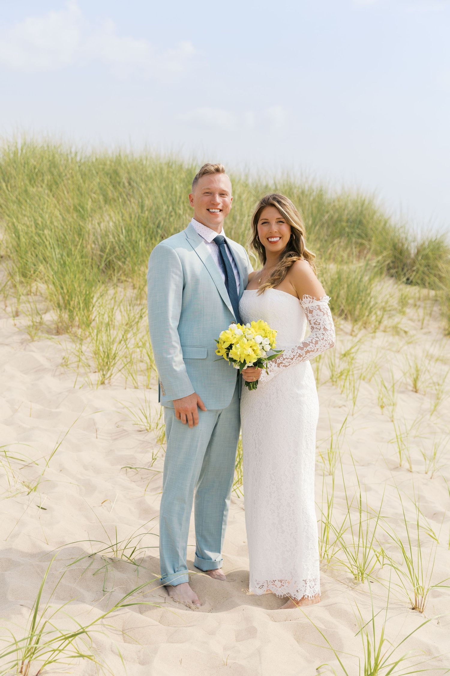 Grand Haven Michigan Elopement Photography at Grand Haven City Beach on Lake Michigan. Coastal summer elopement. From, Rayna Photography