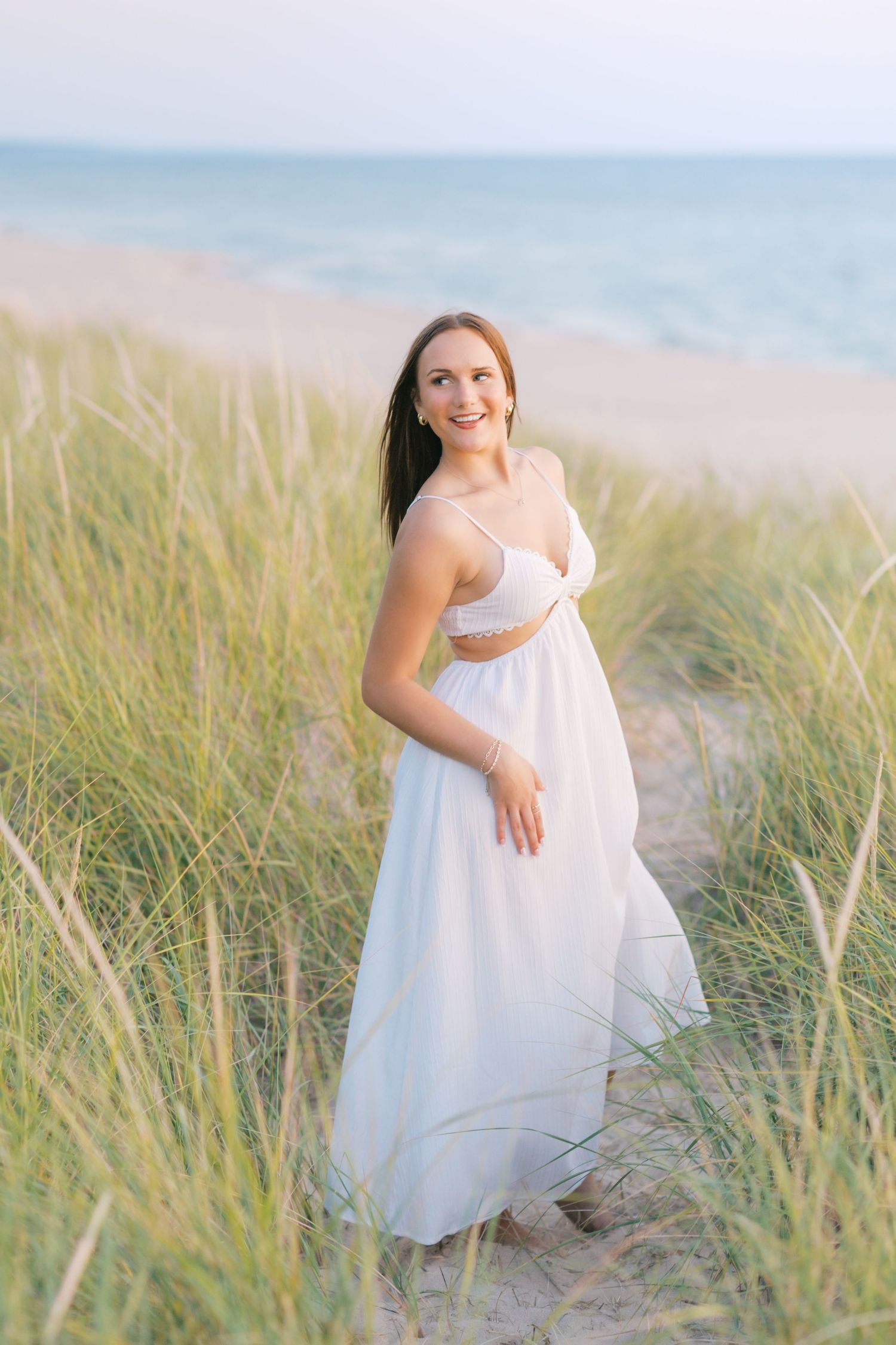 Grand Haven Michigan senior portrait photography pictures, Beach and boardwalk location. summer beach senior pictures in west michigan
