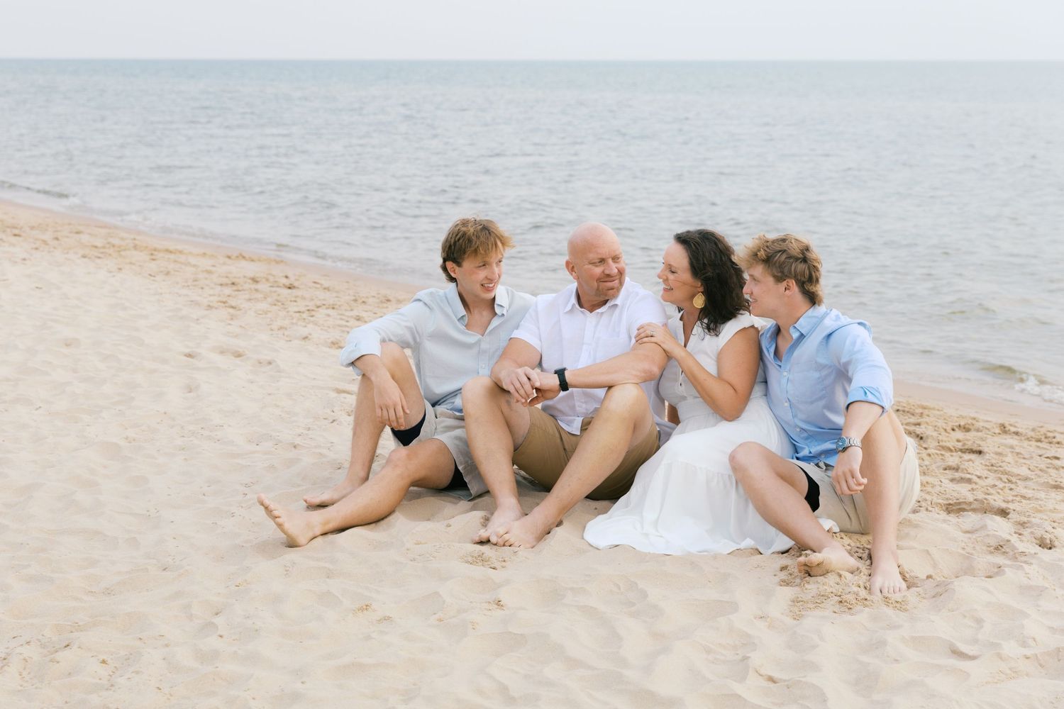 Grand Haven Summer Beach Family Pictures Lake Michigan. West Michigan Family Photographer Blue and white beach family outfit inspiration