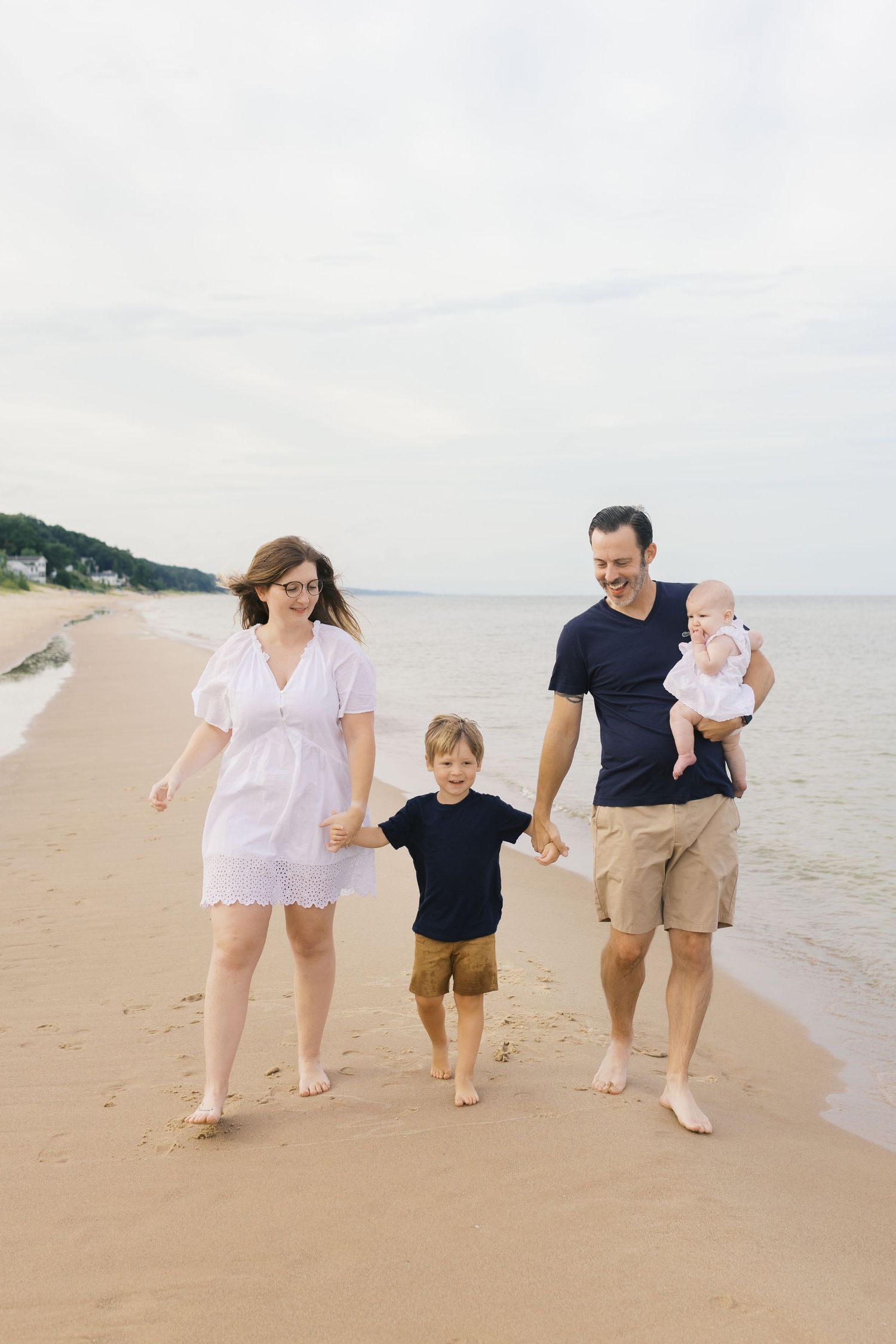 Grand Haven Michigan Beach Photography Family senior engagement photography on Lake Michigan. Grand Haven Michigan Photographer Inspiration