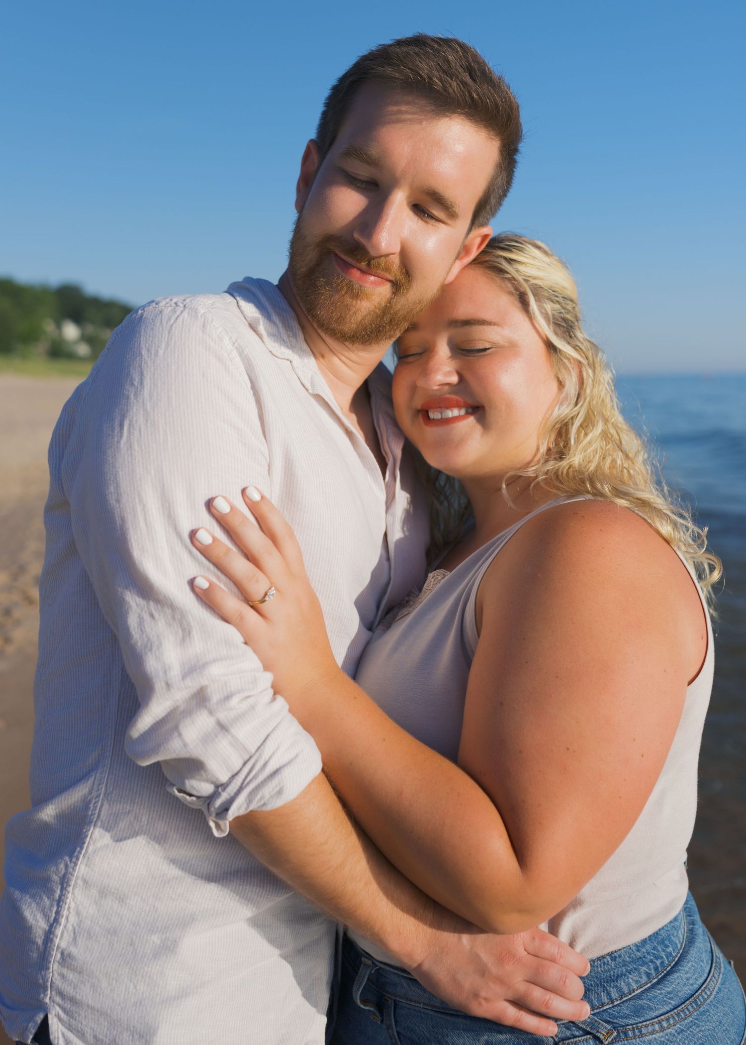 Grand Haven Michigan Beach Photography Family senior engagement photography on Lake Michigan. Grand Haven Michigan Photographer Inspiration