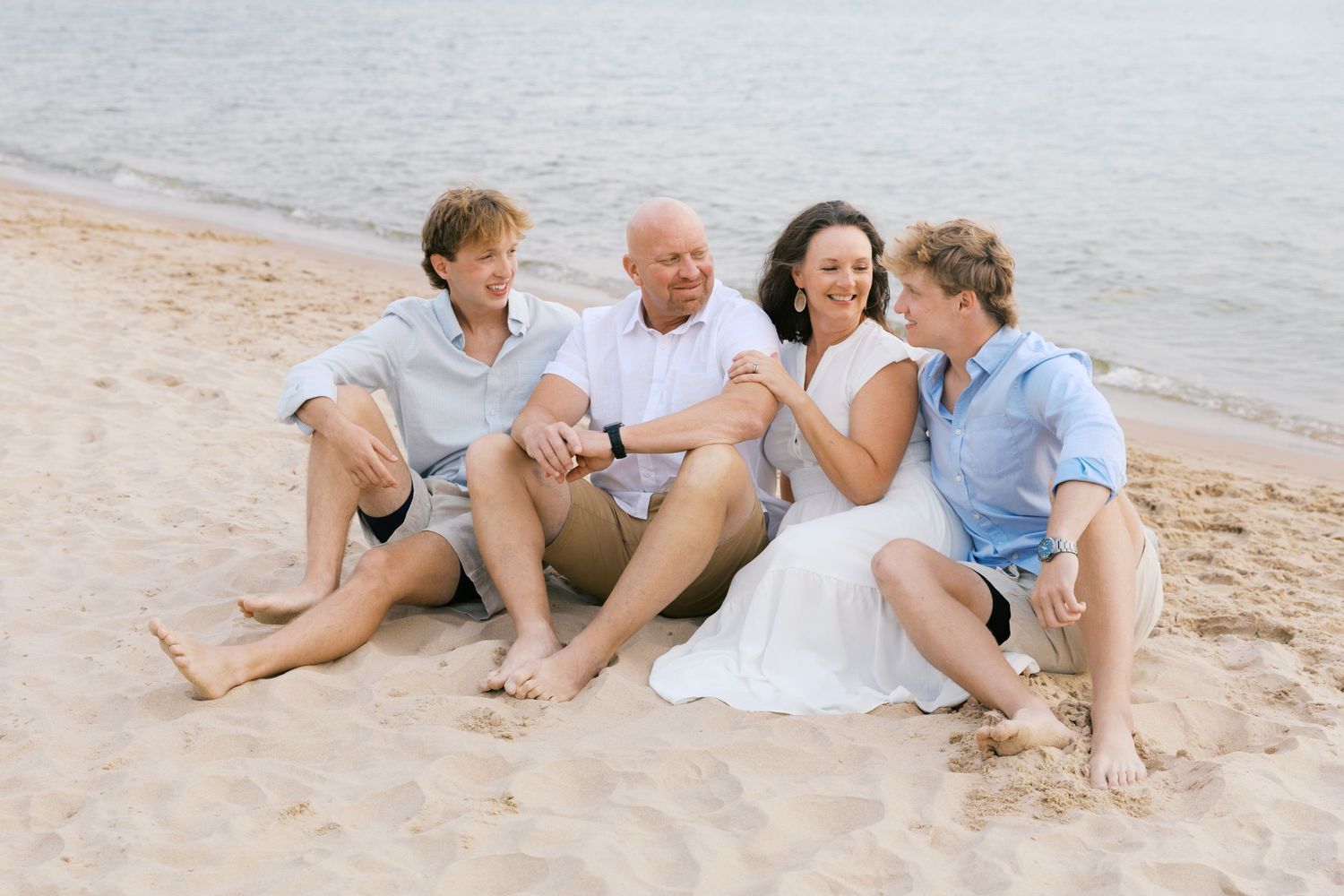 Grand Haven Summer Beach Family Pictures Lake Michigan. West Michigan Family Photographer Blue and white beach family outfit inspiration
