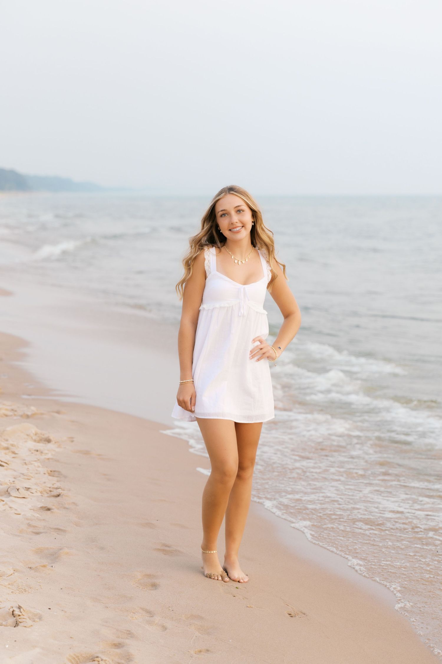 Senior Portrait Photography in Grand Haven Michigan a coastal beachtown on Lake Michigan. Beaches and downtown, sand dunes, senior year