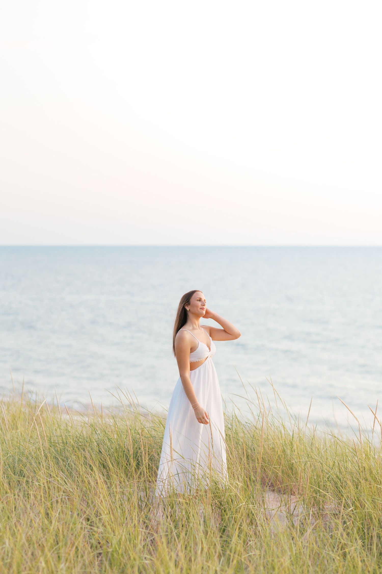 Grand Haven Michigan senior portrait photography pictures, Beach and boardwalk location. summer beach senior pictures in west michigan