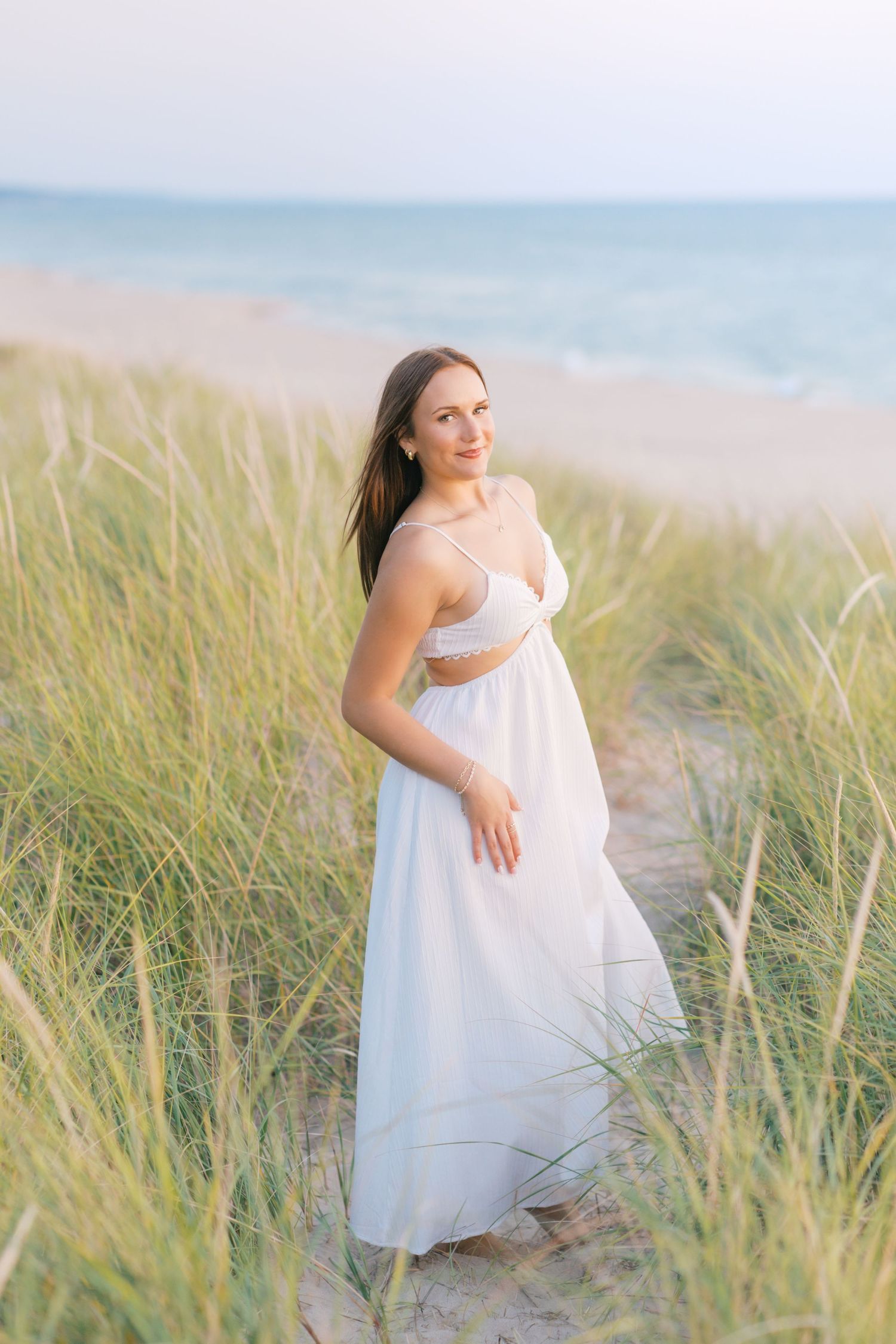 Grand Haven Michigan senior portrait photography pictures, Beach and boardwalk location. summer beach senior pictures in west michigan