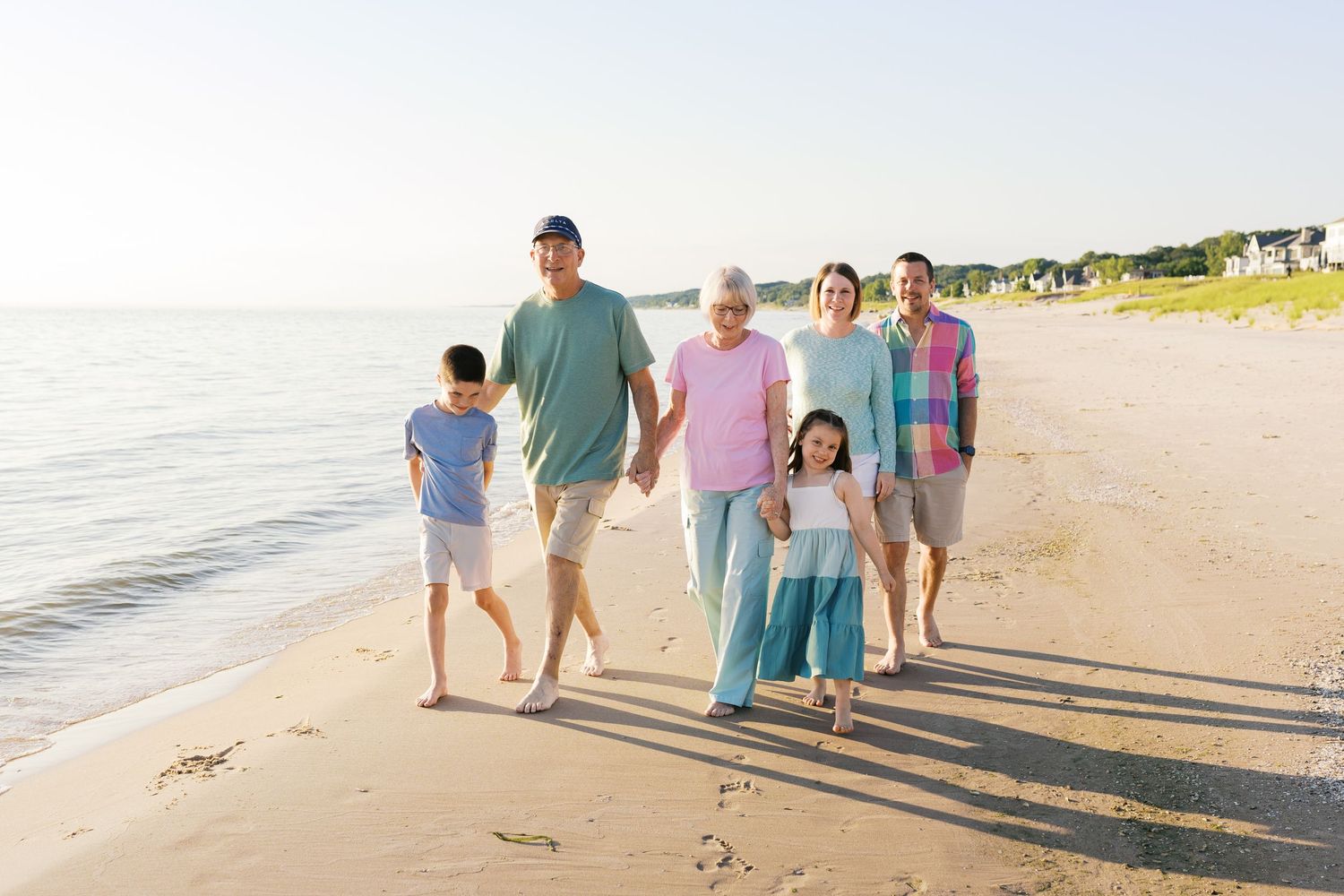 Grand Haven Michigan Beach Photography Family senior engagement photography on Lake Michigan. Grand Haven Michigan Photographer Inspiration