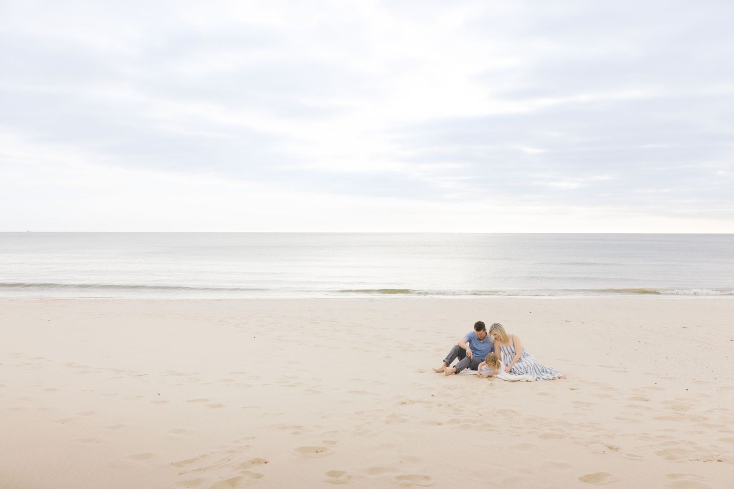 Grand Haven Michigan Beach Photography Family senior engagement photography on Lake Michigan. Grand Haven Michigan Photographer Inspiration