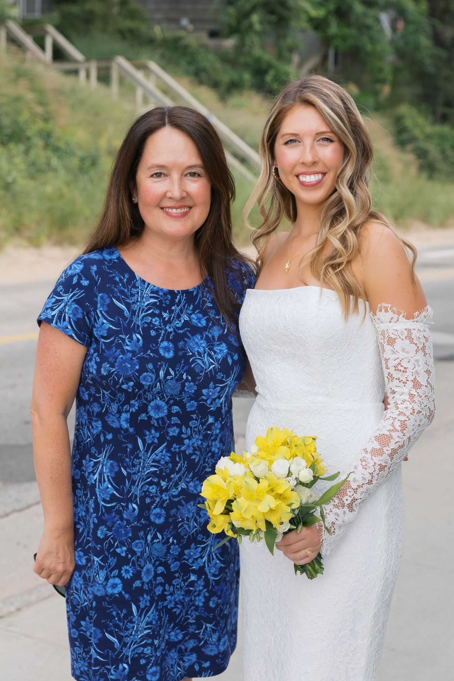 Grand Haven Michigan Elopement Photography at Grand Haven City Beach on Lake Michigan. Coastal summer elopement. From, Rayna Photography