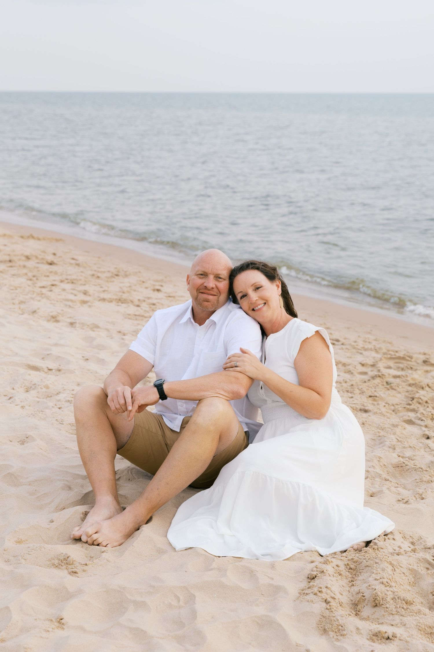 Grand Haven Summer Beach Family Pictures Lake Michigan. West Michigan Family Photographer Blue and white beach family outfit inspiration